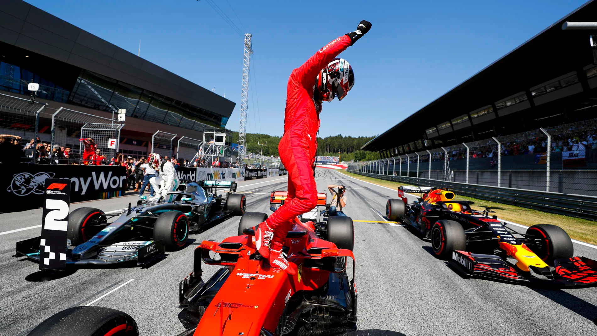 RED BULL RING, AUSTRIA - JUNE 29: Charles Leclerc, Ferrari, celebrates pole on the grid during the Austrian GP at Red Bull Ring on June 29, 2019 in Red Bull Ring, Austria. (Photo by Steven Tee / LAT Images)