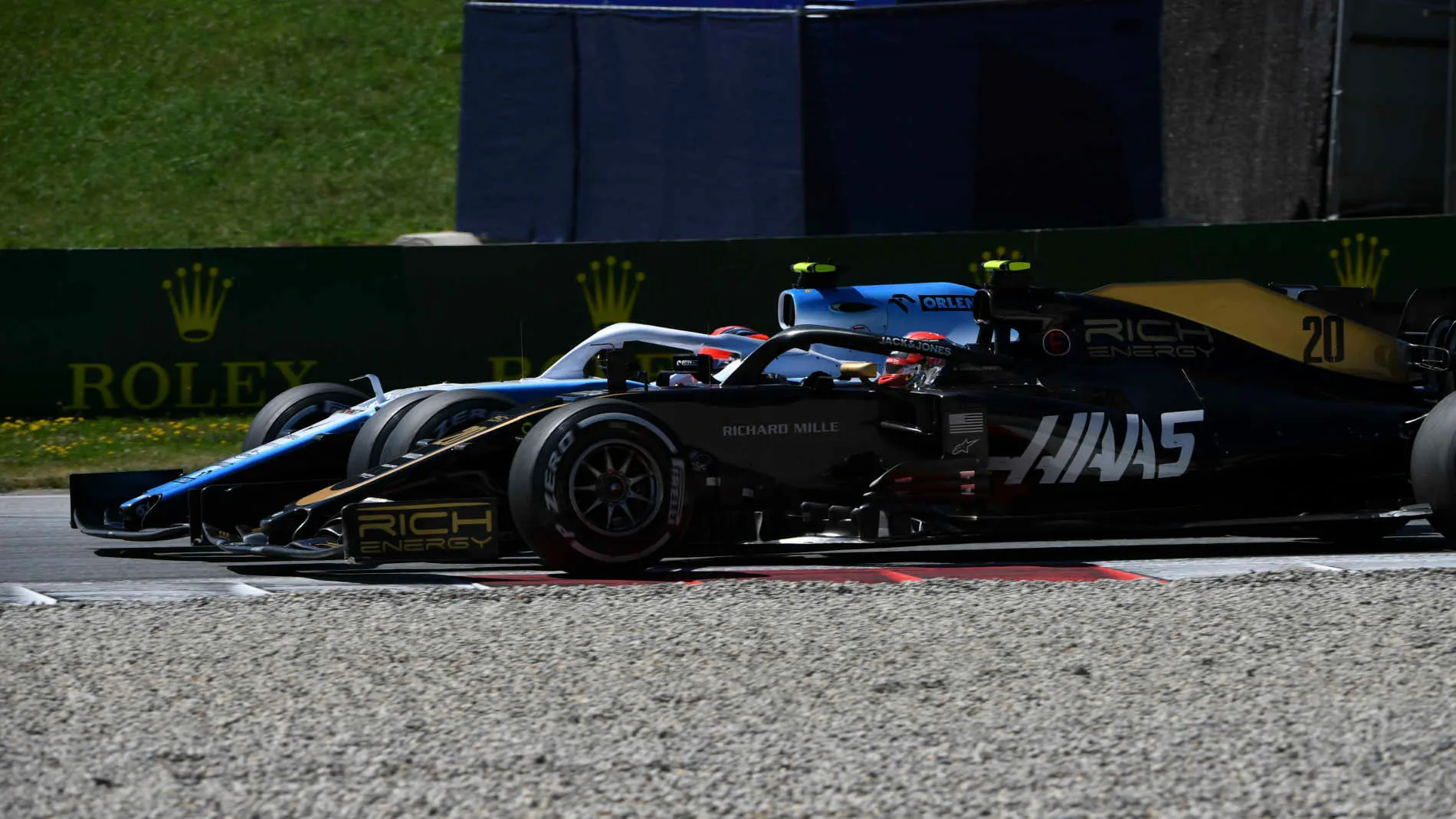 RED BULL RING, AUSTRIA - JUNE 30: Robert Kubica, Williams FW42, battles with Kevin Magnussen, Haas