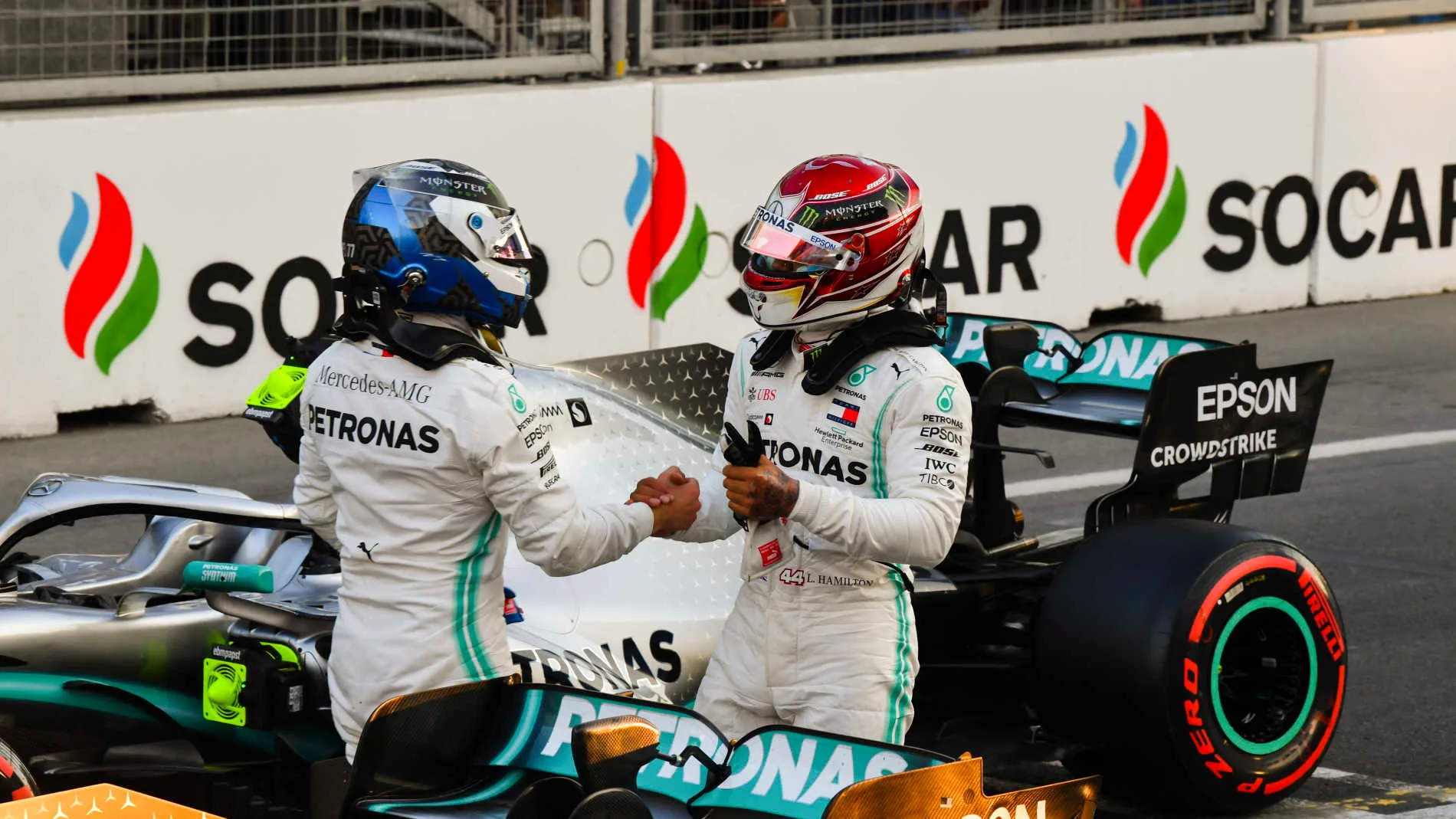 BAKU CITY CIRCUIT, AZERBAIJAN - APRIL 27: Pole man Valtteri Bottas, Mercedes AMG F1, and Lewis Hamilton, Mercedes AMG F1, congratulate each other after Qualifying during the Azerbaijan GP at Baku City Circuit on April 27, 2019 in Baku City Circuit, Azerbaijan. (Photo by Mark Sutton / Sutton Images)