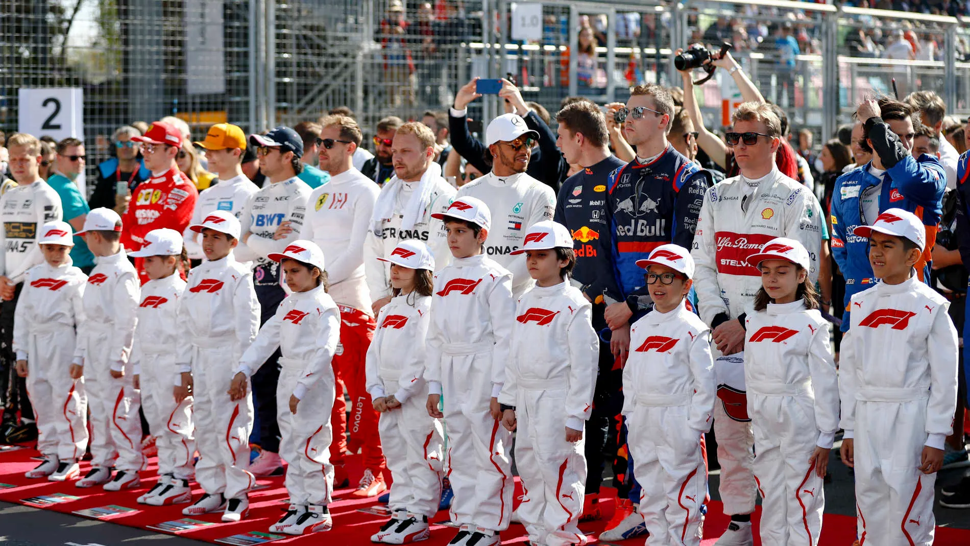 BAKU CITY CIRCUIT, AZERBAIJAN - APRIL 28: Drivers and Grid Kids during the National Anthem on the