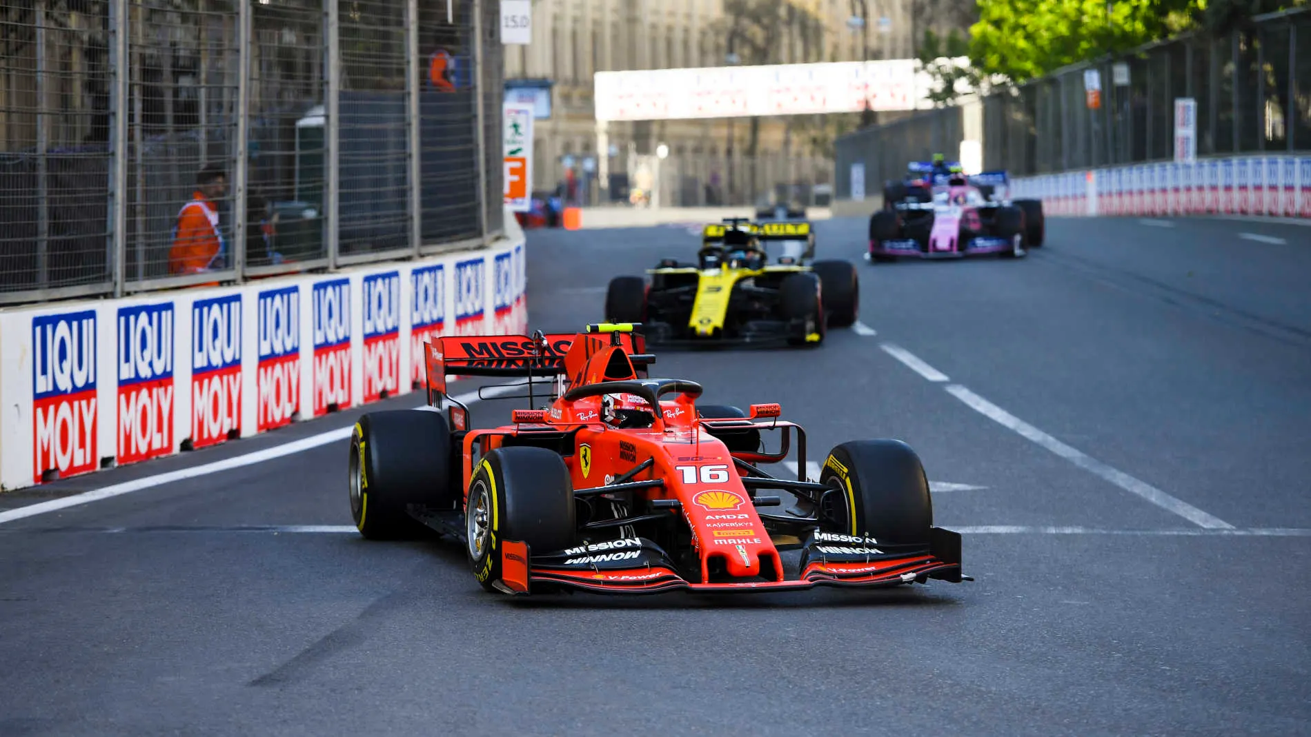 BAKU CITY CIRCUIT, AZERBAIJAN - APRIL 28: Charles Leclerc, Ferrari SF90, leads Daniel Ricciardo,