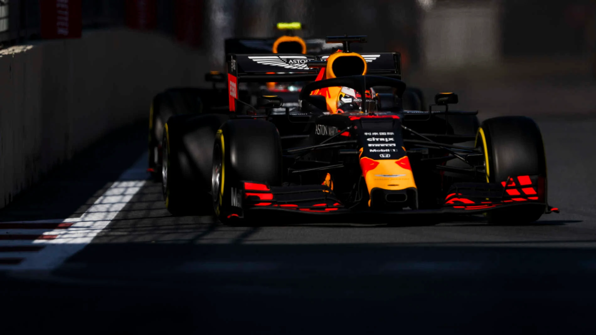 BAKU CITY CIRCUIT, AZERBAIJAN - APRIL 28: Max Verstappen, Red Bull Racing RB15, leads Pierre Gasly,