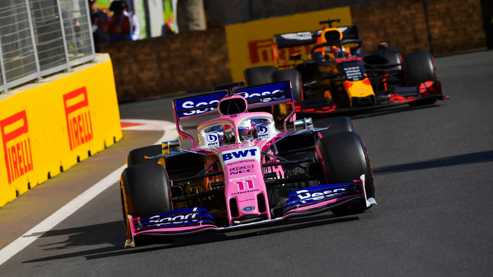BAKU CITY CIRCUIT, AZERBAIJAN - APRIL 28: Sergio Perez, Racing Point RP19, leads Max Verstappen,