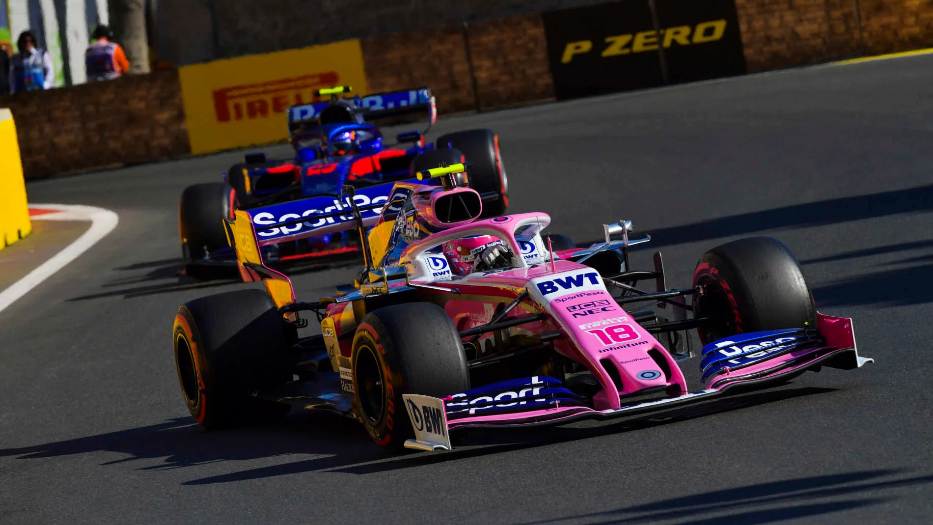 BAKU CITY CIRCUIT, AZERBAIJAN - APRIL 28: Lance Stroll, Racing Point RP19, leads Alexander Albon,