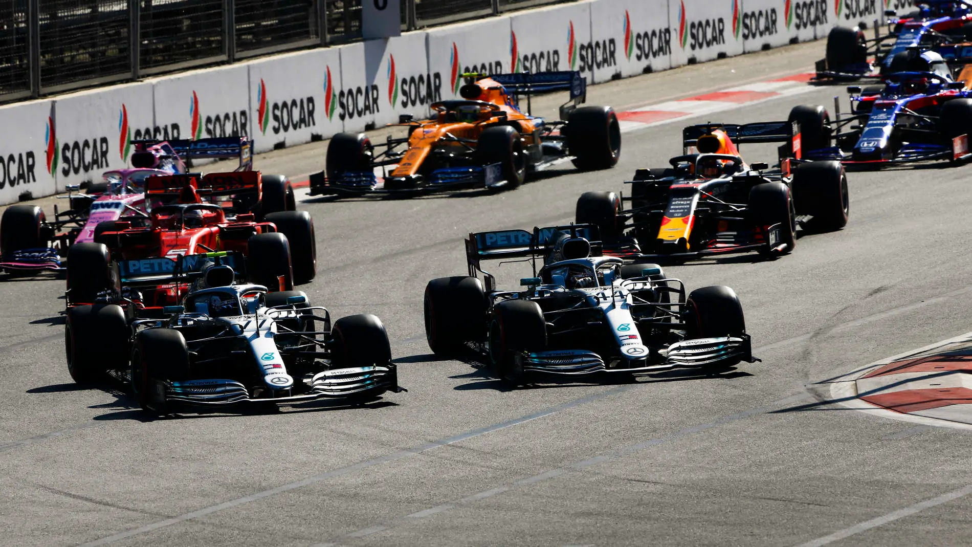BAKU CITY CIRCUIT, AZERBAIJAN - APRIL 28: Valtteri Bottas, Mercedes AMG W10, leads Lewis Hamilton,