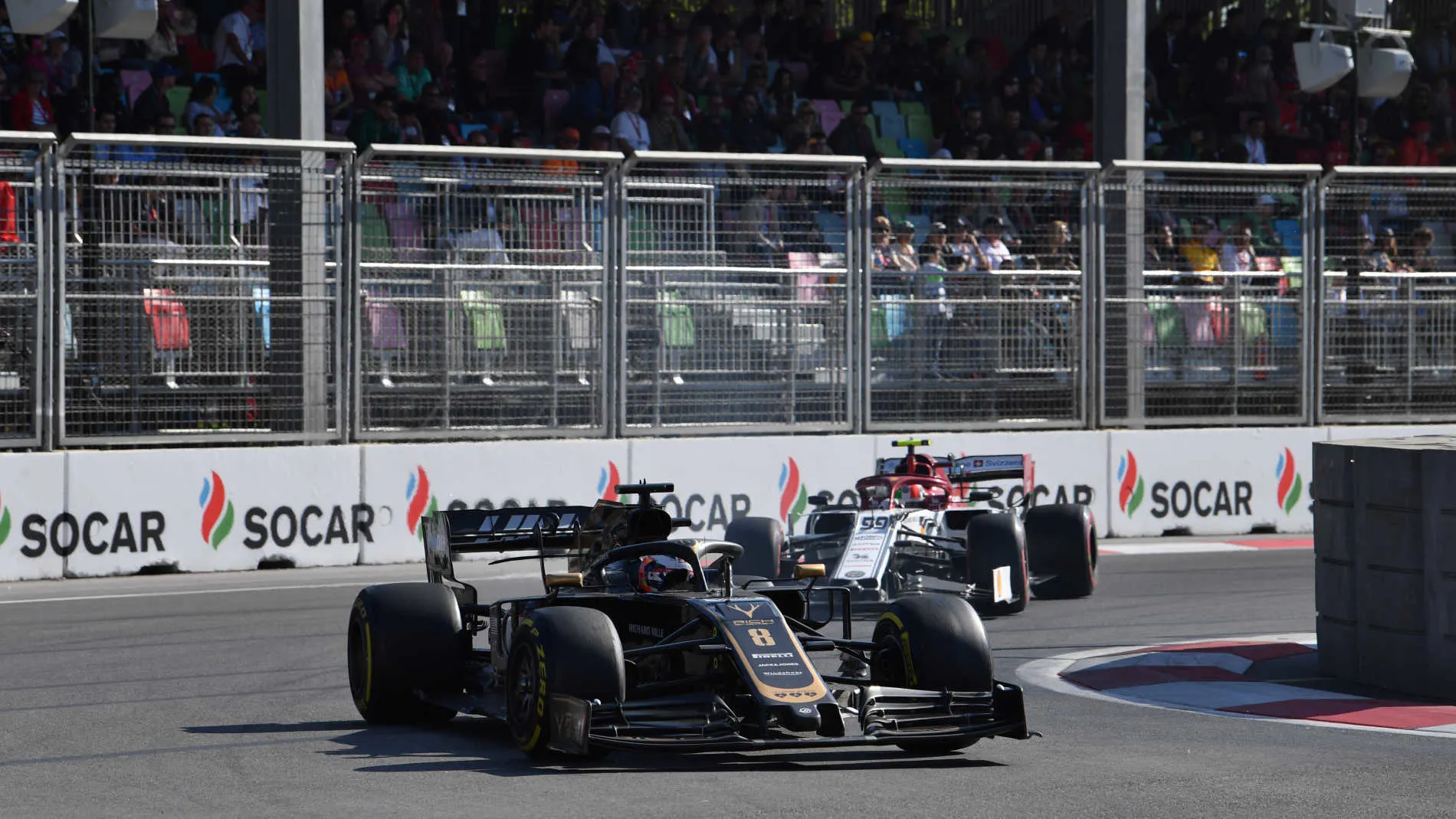 BAKU CITY CIRCUIT, AZERBAIJAN - APRIL 28: Romain Grosjean, Haas VF-19, leads Antonio Giovinazzi,