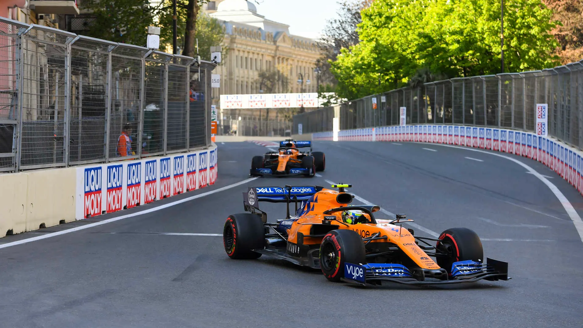BAKU CITY CIRCUIT, AZERBAIJAN - APRIL 28: Lando Norris, McLaren MCL34, leads Carlos Sainz Jr.,