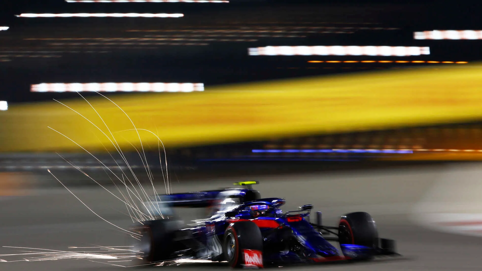 BAHRAIN INTERNATIONAL CIRCUIT, BAHRAIN - MARCH 30: Sparks fly from the car of Alexander Albon, Toro Rosso STR14 during the Bahrain GP at Bahrain International Circuit on March 30, 2019 in Bahrain International Circuit, Bahrain. (Photo by Andy Hone / LAT Images)