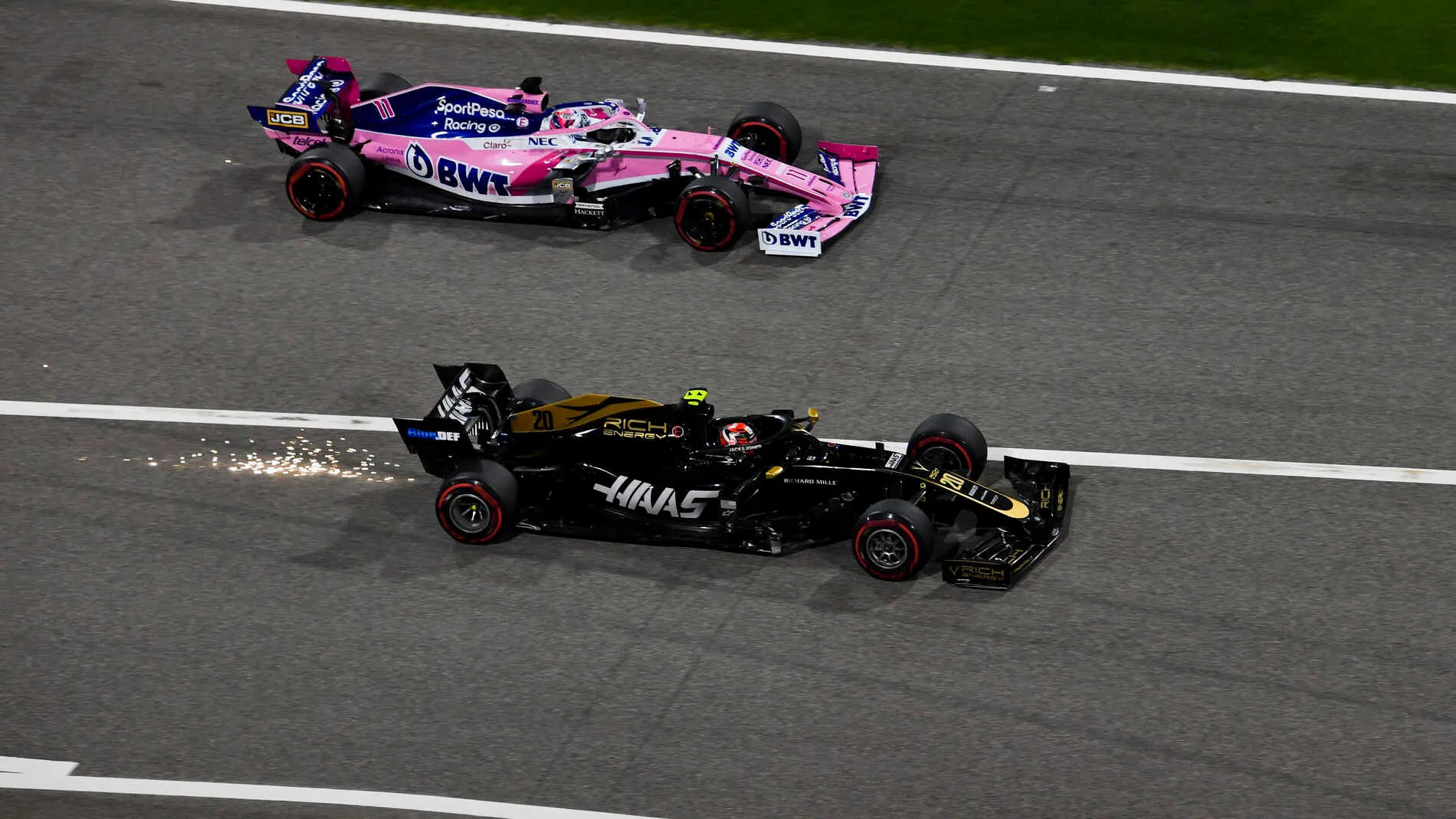 BAHRAIN INTERNATIONAL CIRCUIT, BAHRAIN - MARCH 31: Sergio Perez, Racing Point RP19 and Kevin