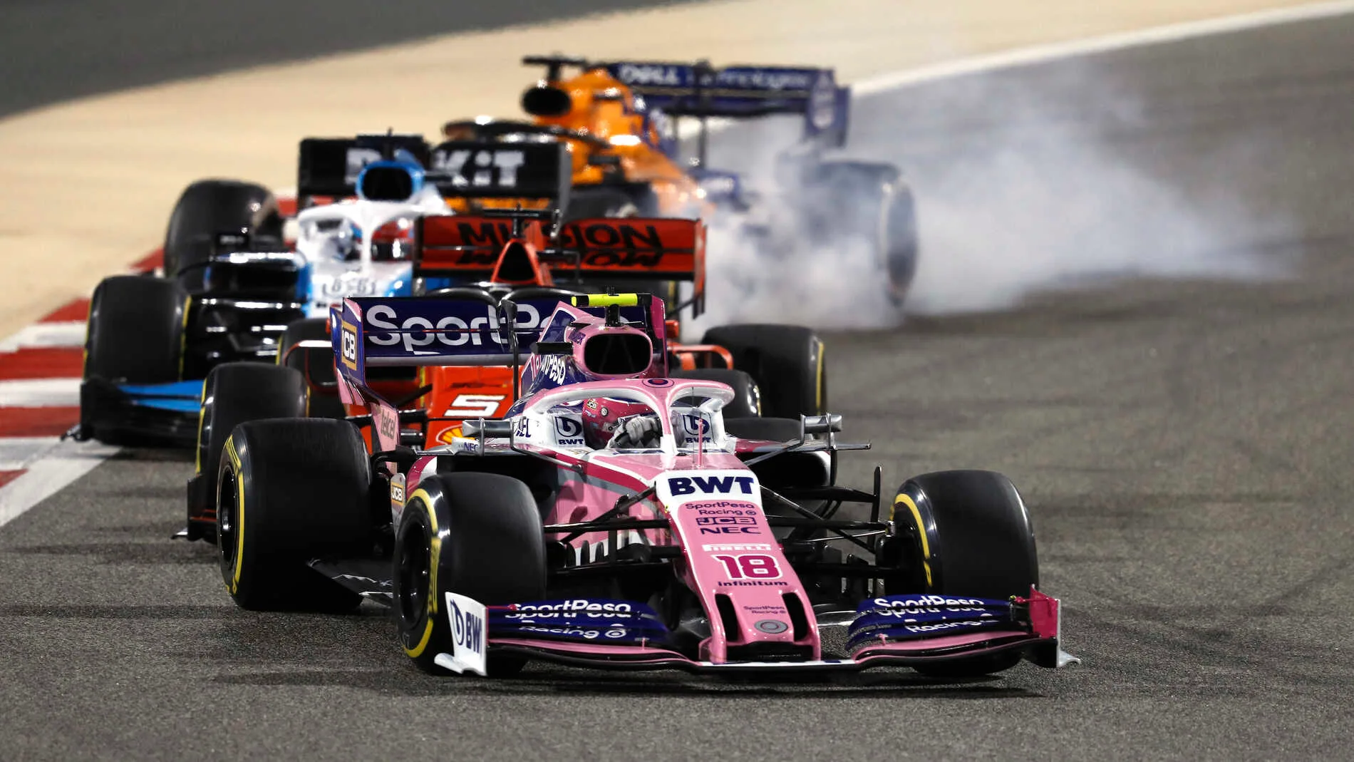 BAHRAIN INTERNATIONAL CIRCUIT, BAHRAIN - MARCH 31: Lance Stroll, Racing Point RP19, leads Sebastian