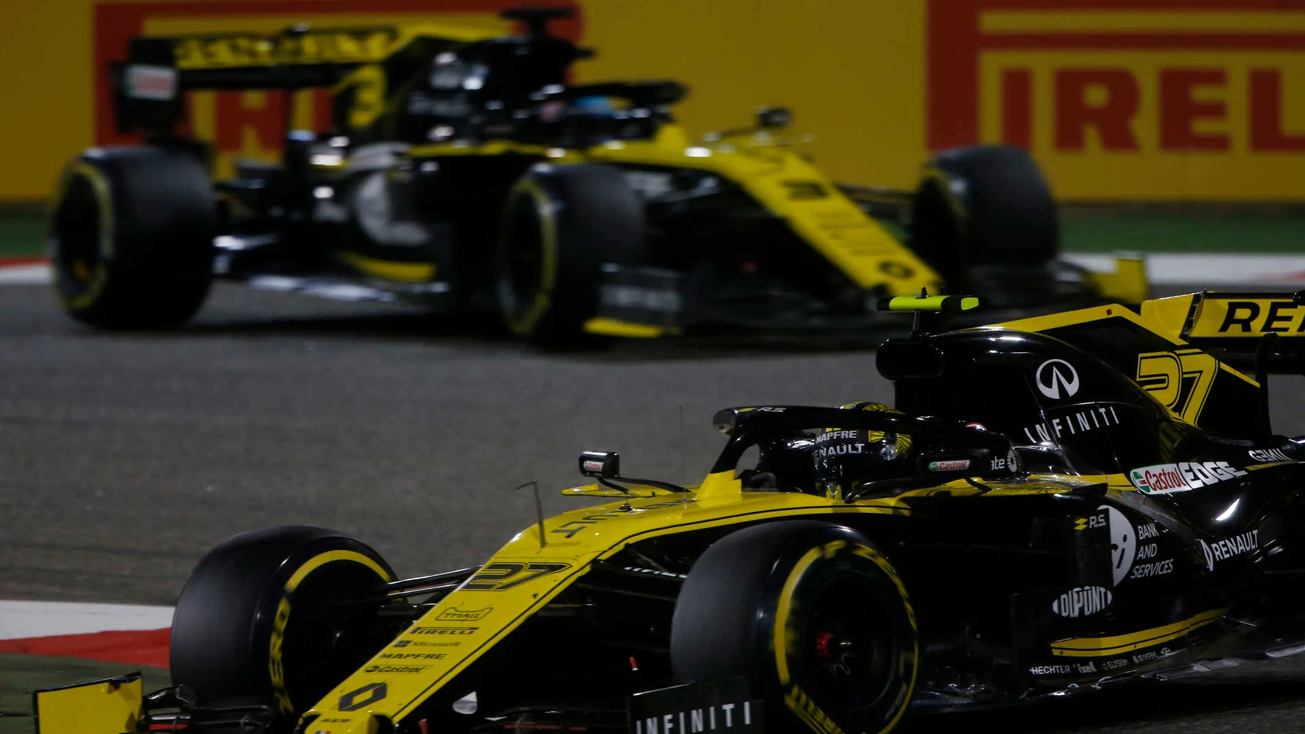 BAHRAIN INTERNATIONAL CIRCUIT, BAHRAIN - MARCH 31: Nico Hulkenberg, Renault R.S. 19, leads Daniel