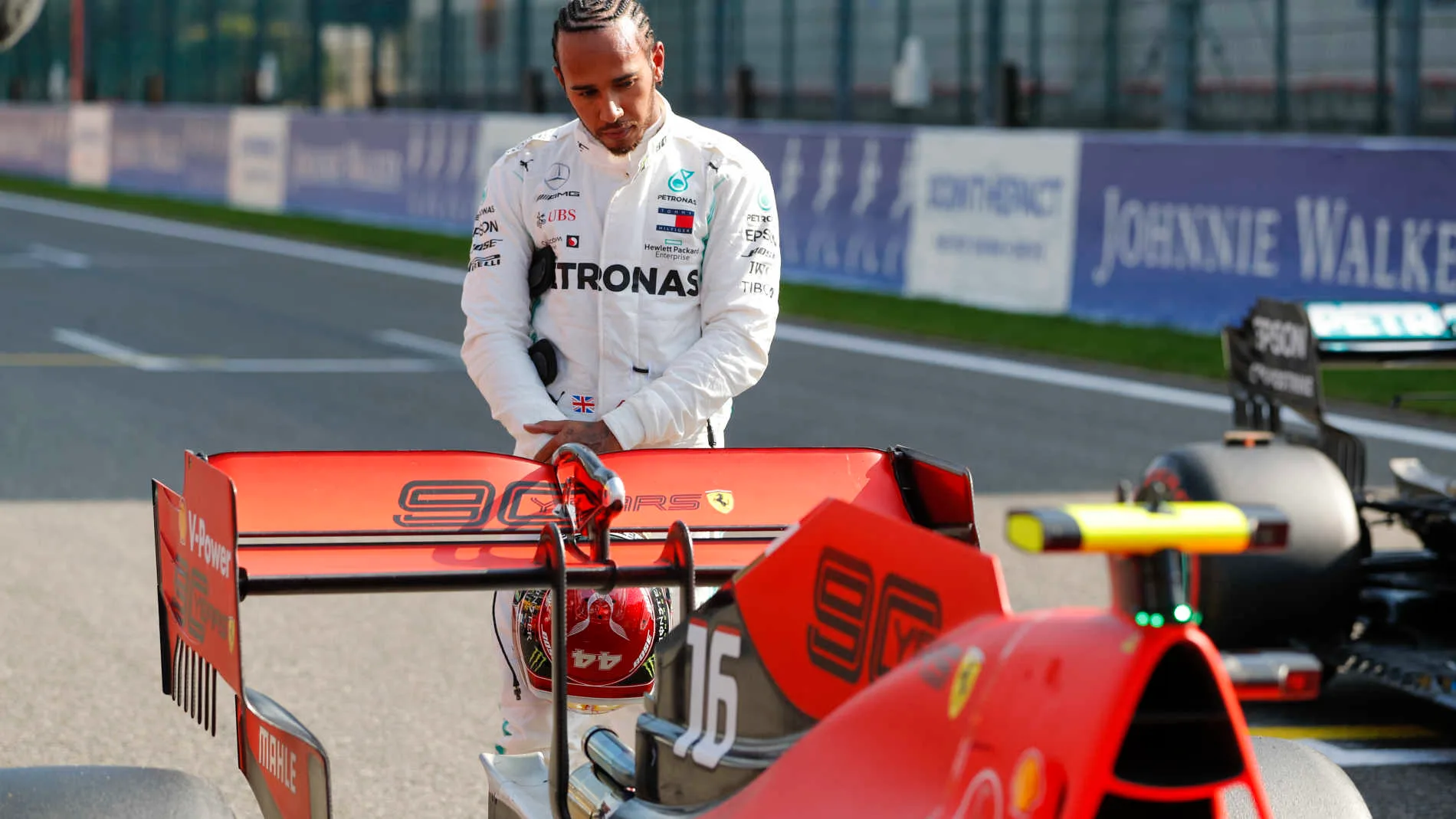 SPA-FRANCORCHAMPS, BELGIUM - AUGUST 31: Lewis Hamilton, Mercedes AMG F1, inspects the Charles