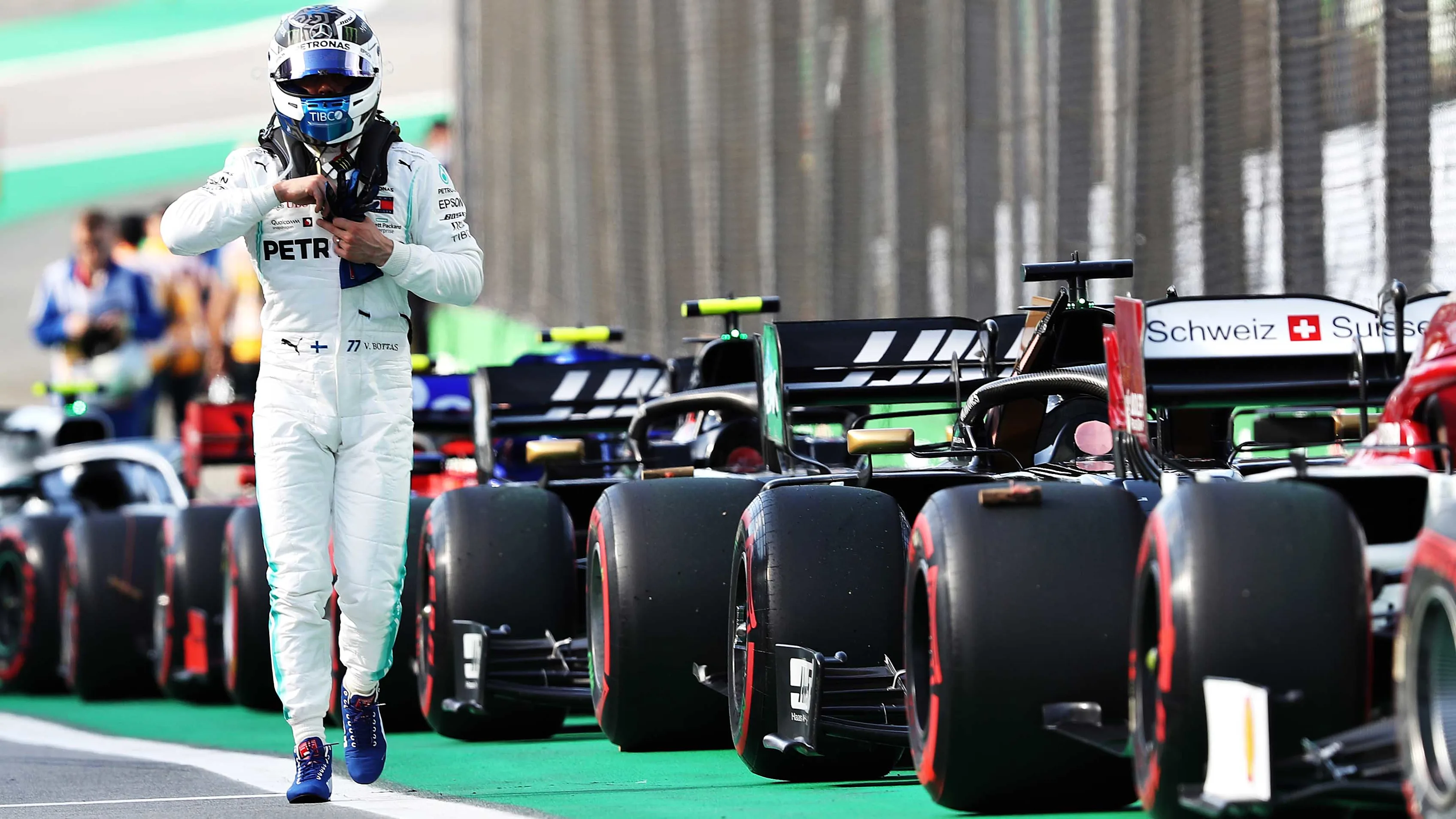 SAO PAULO, BRAZIL - NOVEMBER 16: Valtteri Bottas of Finland and Mercedes GP walks in parc ferme