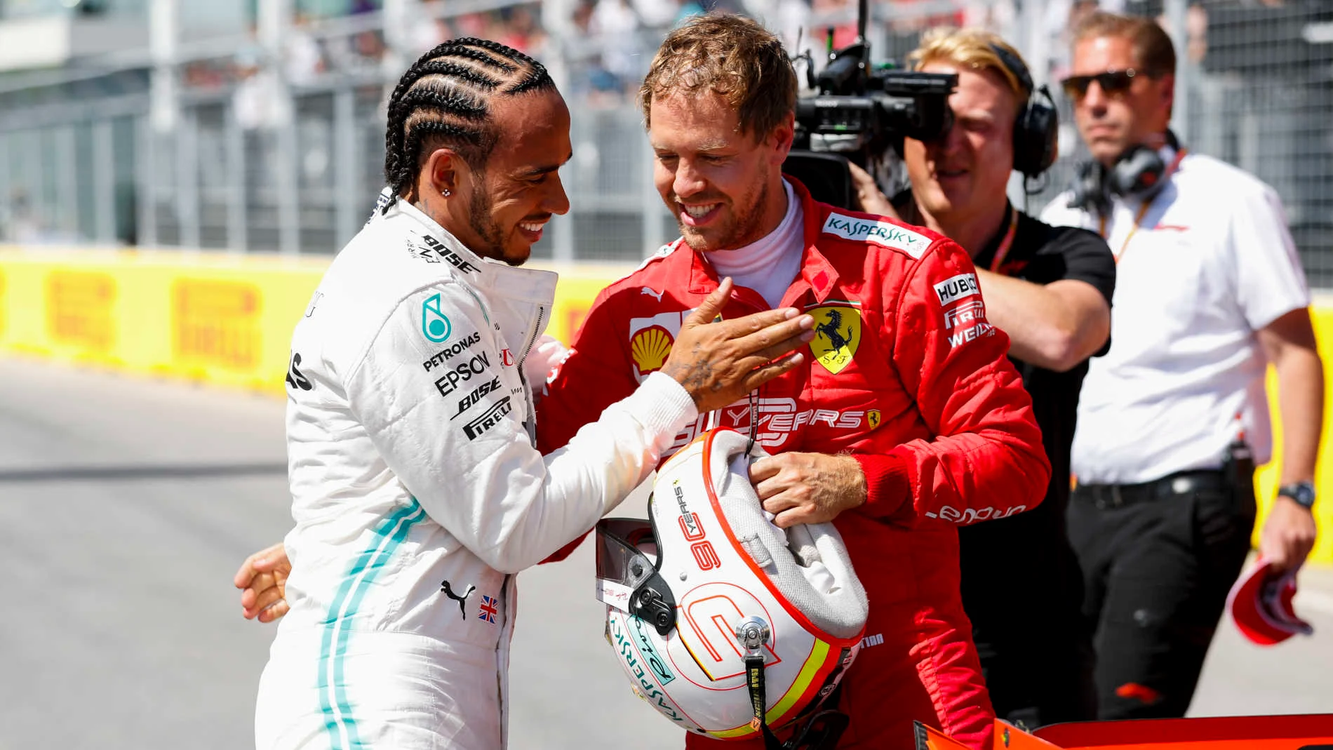 CIRCUIT GILLES-VILLENEUVE, CANADA - JUNE 08: Sebastian Vettel, Ferrari Pole sitter and Lewis Hamilton, Mercedes AMG F1 celebrate in Parc Ferme during the Canadian GP at Circuit Gilles-Villeneuve on June 08, 2019 in Circuit Gilles-Villeneuve, Canada. (Photo by Steven Tee / LAT Images)