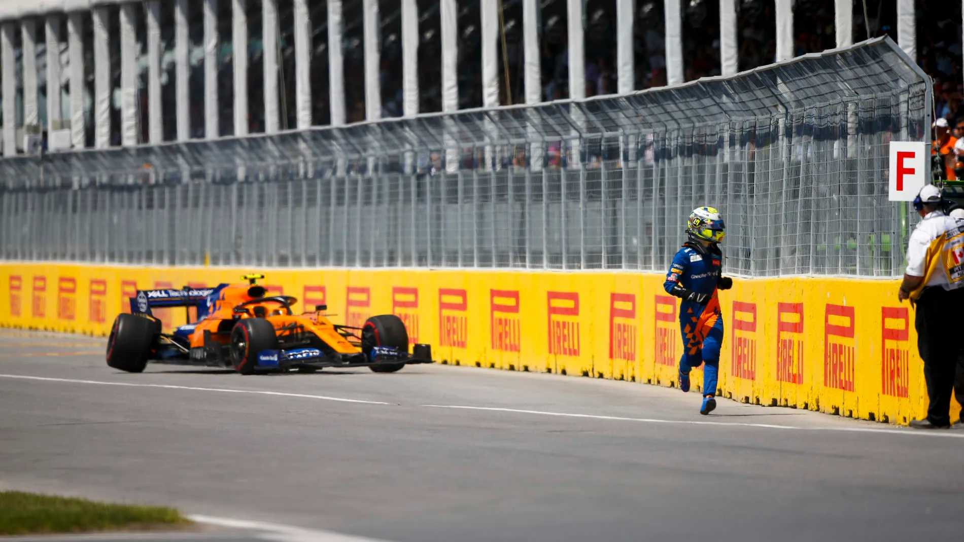 CIRCUIT GILLES-VILLENEUVE, CANADA - JUNE 09: Lando Norris, McLaren MCL34 runs away from his car