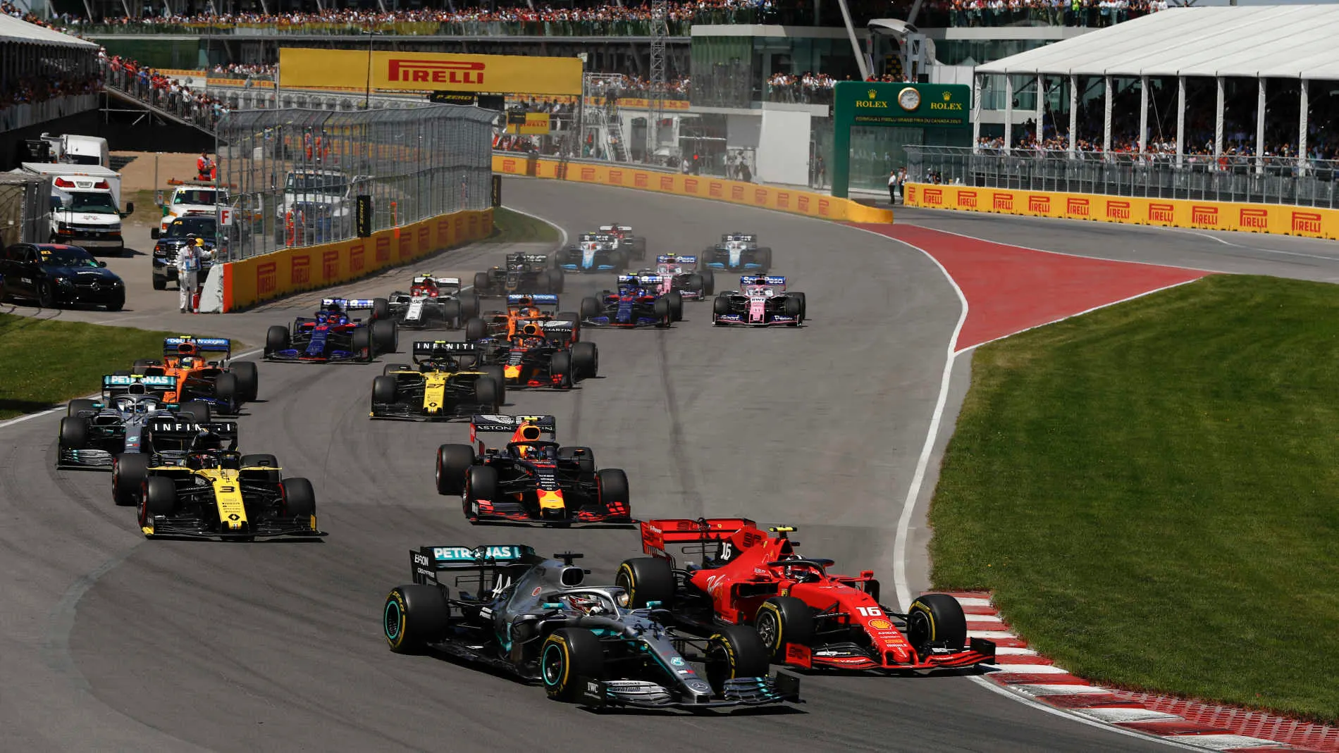 CIRCUIT GILLES-VILLENEUVE, CANADA - JUNE 09: Lewis Hamilton, Mercedes AMG F1 W10, leads Charles