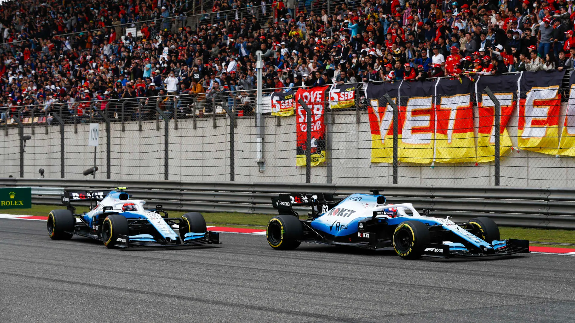 SHANGHAI INTERNATIONAL CIRCUIT, CHINA - APRIL 14: George Russell, Williams Racing FW42 leads Robert Kubica, Williams FW42 during the Chinese GP at Shanghai International Circuit on April 14, 2019 in Shanghai International Circuit, China. (Photo by Glenn Dunbar / LAT Images)