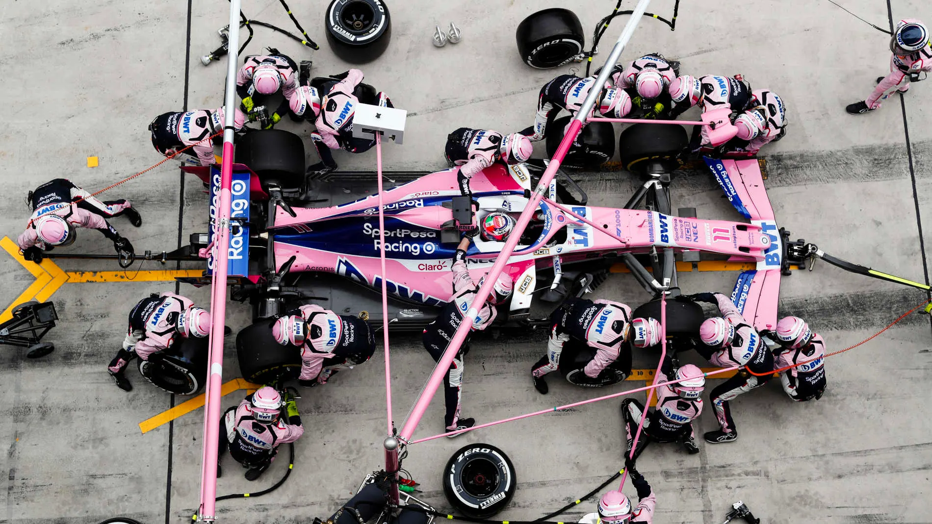 SHANGHAI INTERNATIONAL CIRCUIT, CHINA - APRIL 14: Sergio Perez, Racing Point RP19, makes a pit stop