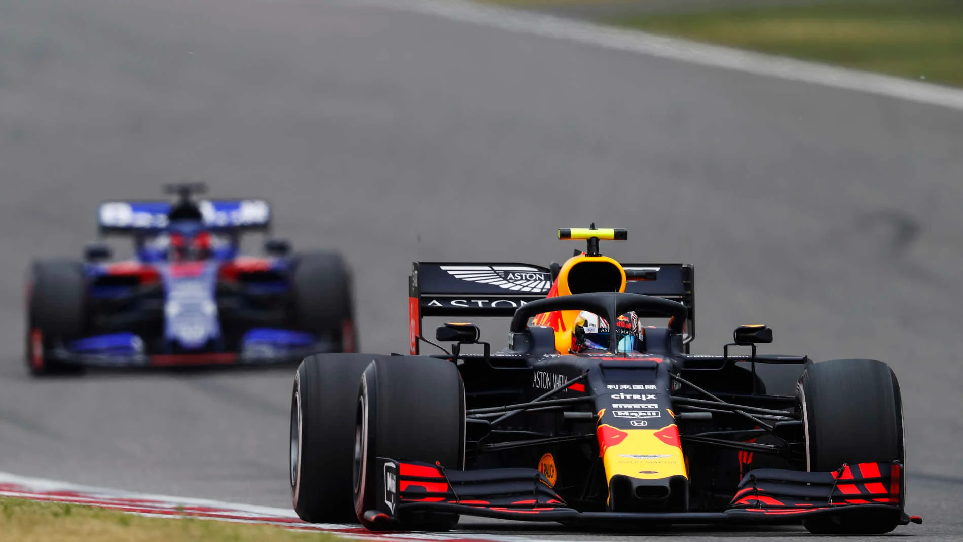 SHANGHAI INTERNATIONAL CIRCUIT, CHINA - APRIL 14: Pierre Gasly, Red Bull Racing RB15, leads Daniil
