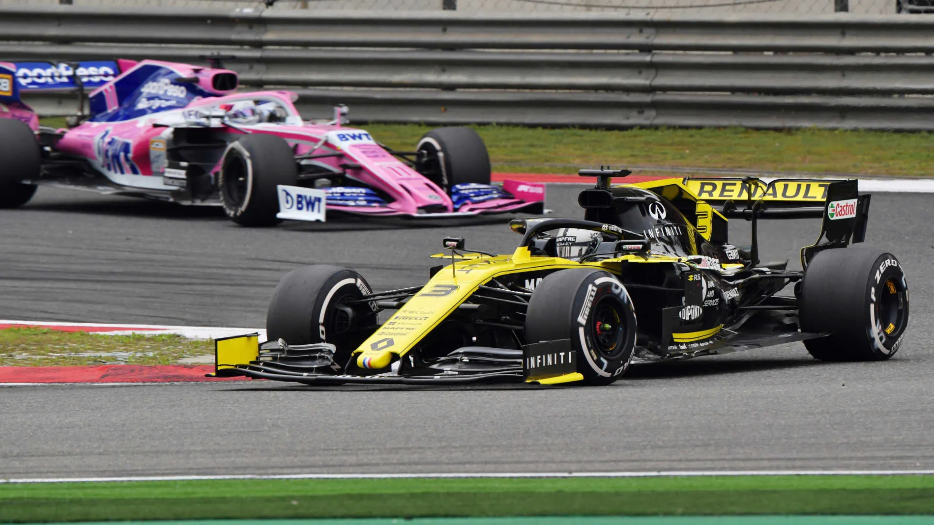 SHANGHAI INTERNATIONAL CIRCUIT, CHINA - APRIL 14: Daniel Ricciardo, Renault R.S.19, leads Sergio