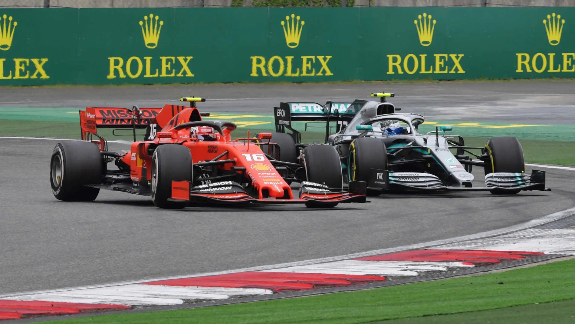 SHANGHAI INTERNATIONAL CIRCUIT, CHINA - APRIL 14: Charles Leclerc, Ferrari SF90, battles with