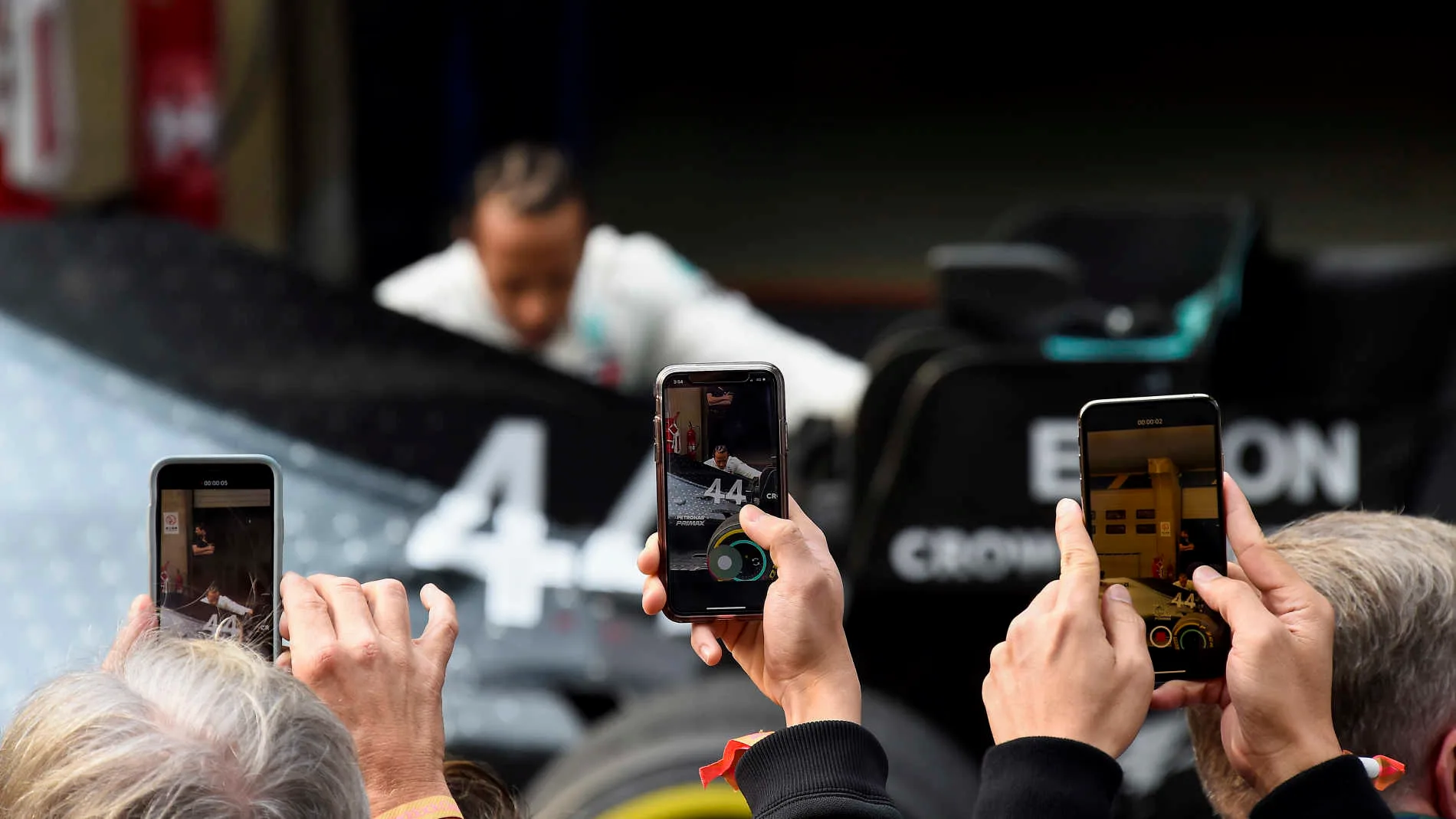 SHANGHAI INTERNATIONAL CIRCUIT, CHINA - APRIL 14: Photos are taken with phones as Lewis Hamilton,