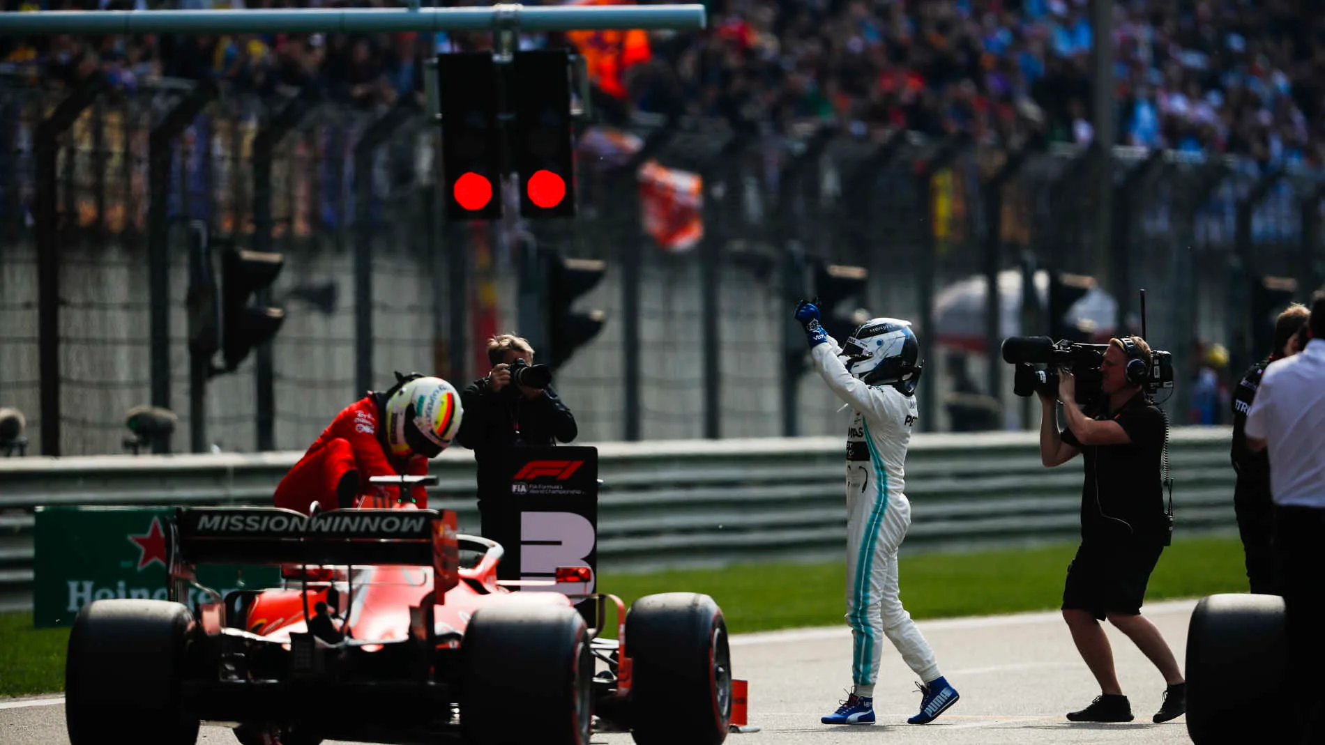 SHANGHAI INTERNATIONAL CIRCUIT, CHINA - APRIL 13: Valtteri Bottas, Mercedes AMG F1, celebrates pole