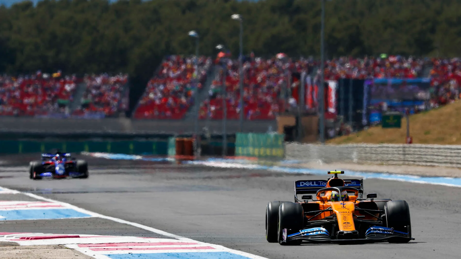 CIRCUIT PAUL RICARD, FRANCE - JUNE 23: Lando Norris, McLaren MCL34, leads Daniil Kvyat, Toro Rosso