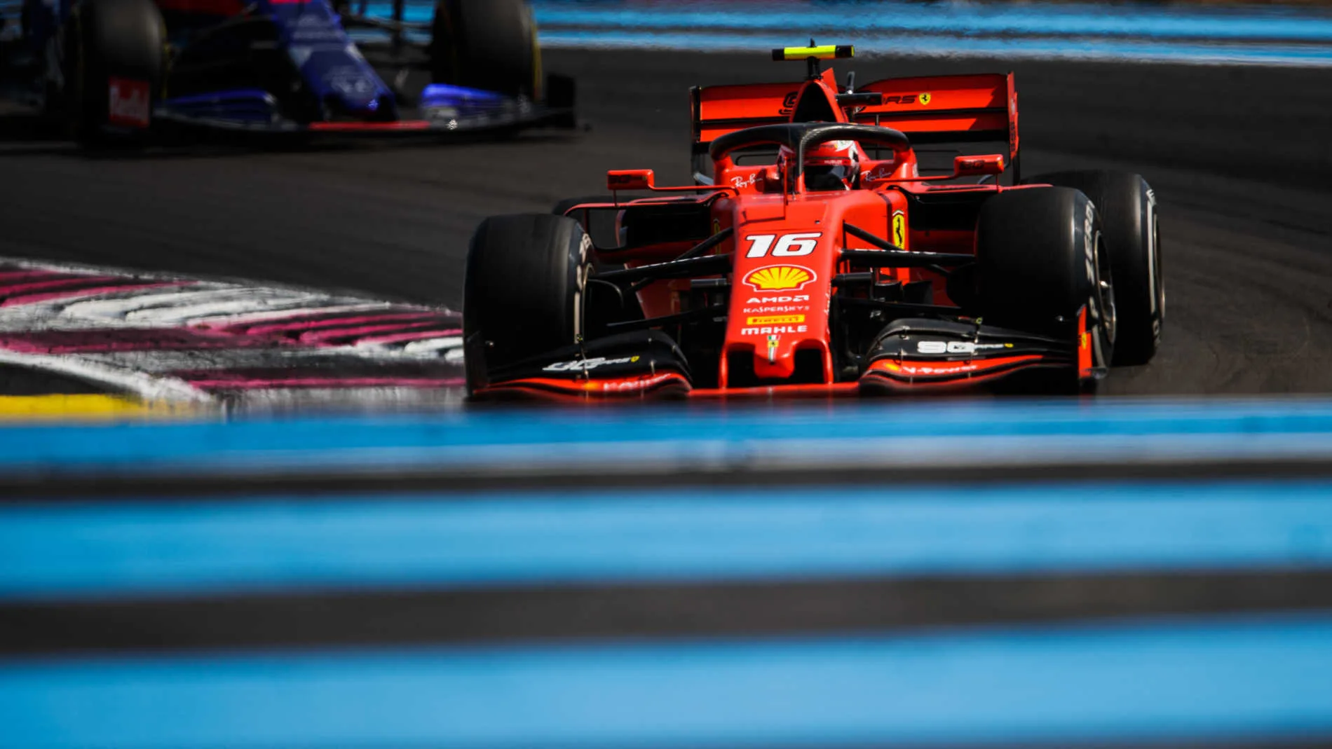 CIRCUIT PAUL RICARD, FRANCE - JUNE 23: Charles Leclerc, Ferrari SF90, leads Daniil Kvyat, Toro