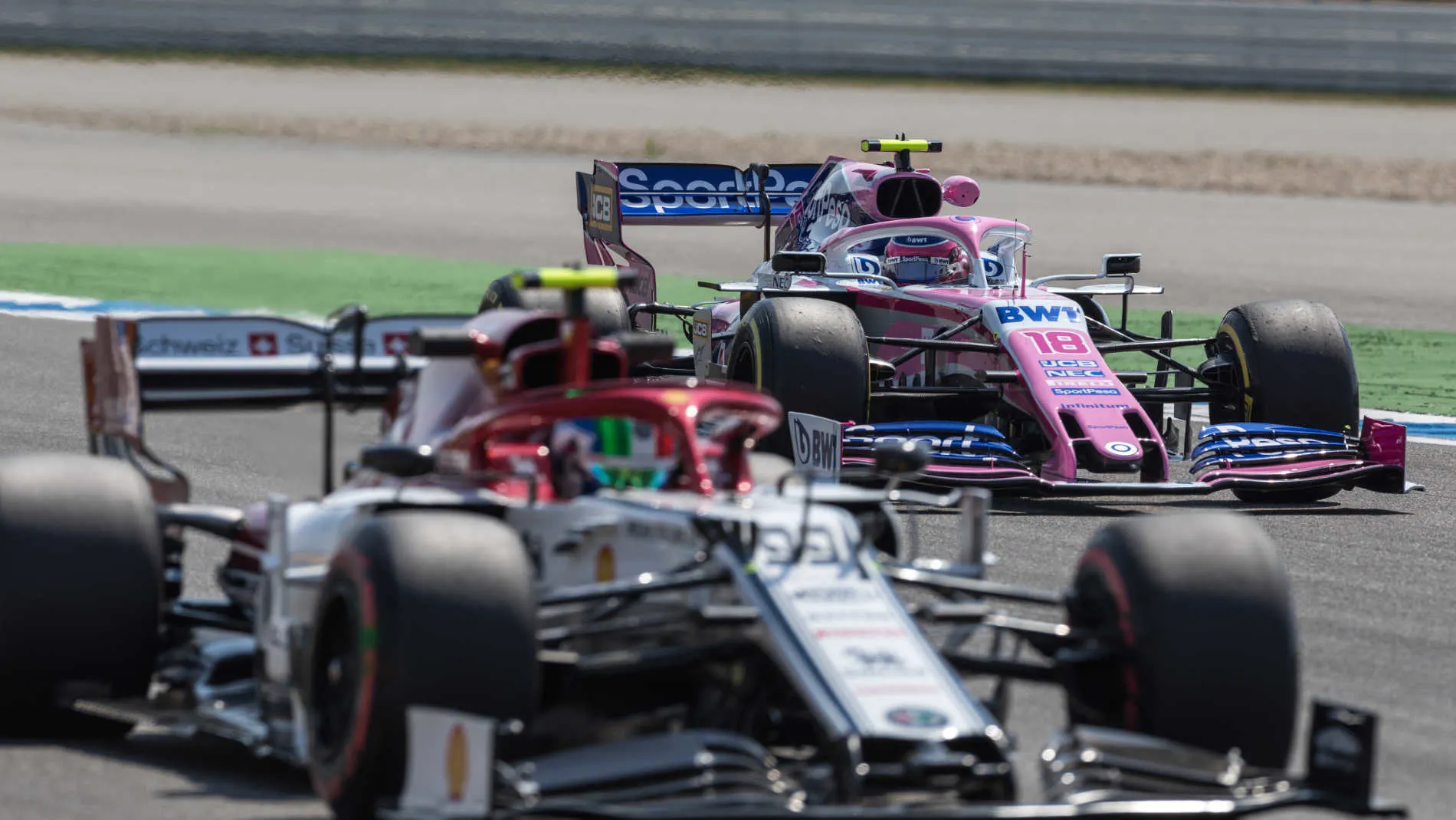 HOCKENHEIMRING, GERMANY - JULY 26: Antonio Giovinazzi, Alfa Romeo Racing C38, leads Lance Stroll,