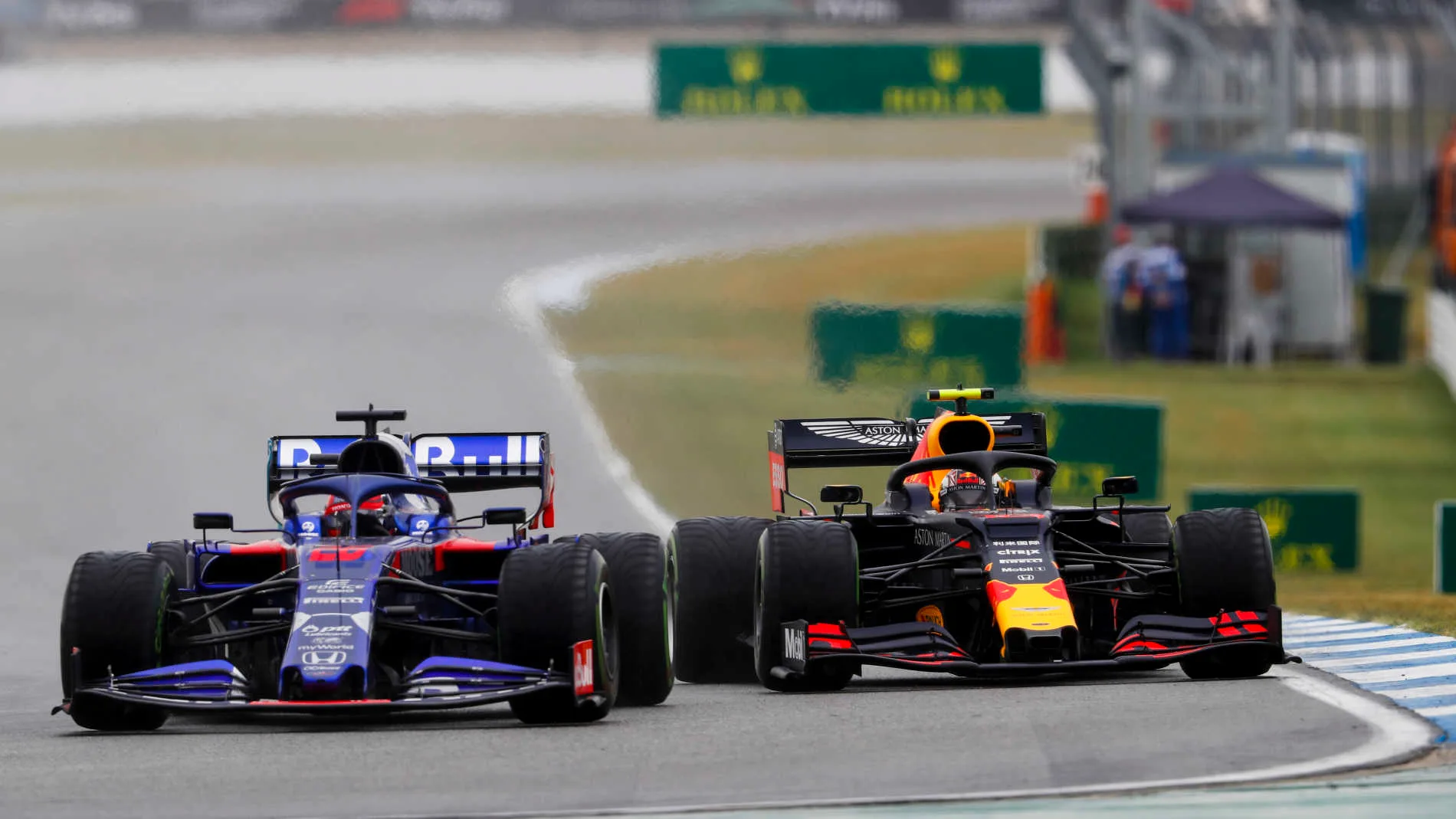 HOCKENHEIMRING, GERMANY - JULY 28: Daniil Kvyat, Toro Rosso STR14, leads Pierre Gasly, Red Bull