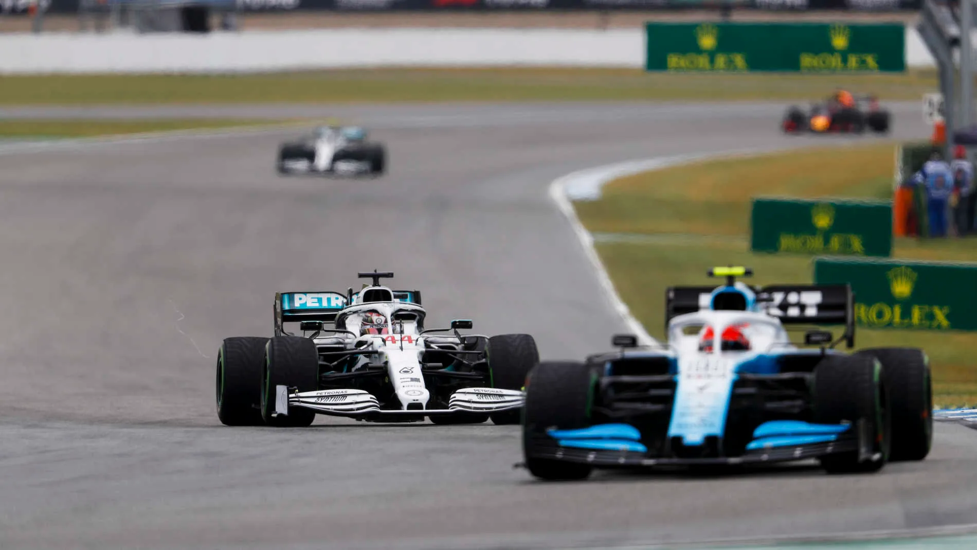 HOCKENHEIMRING, GERMANY - JULY 28: Robert Kubica, Williams FW42, leads Lewis Hamilton, Mercedes AMG F1 W10 during the German GP at Hockenheimring on July 28, 2019 in Hockenheimring, Germany. (Photo by Zak Mauger / LAT Images)