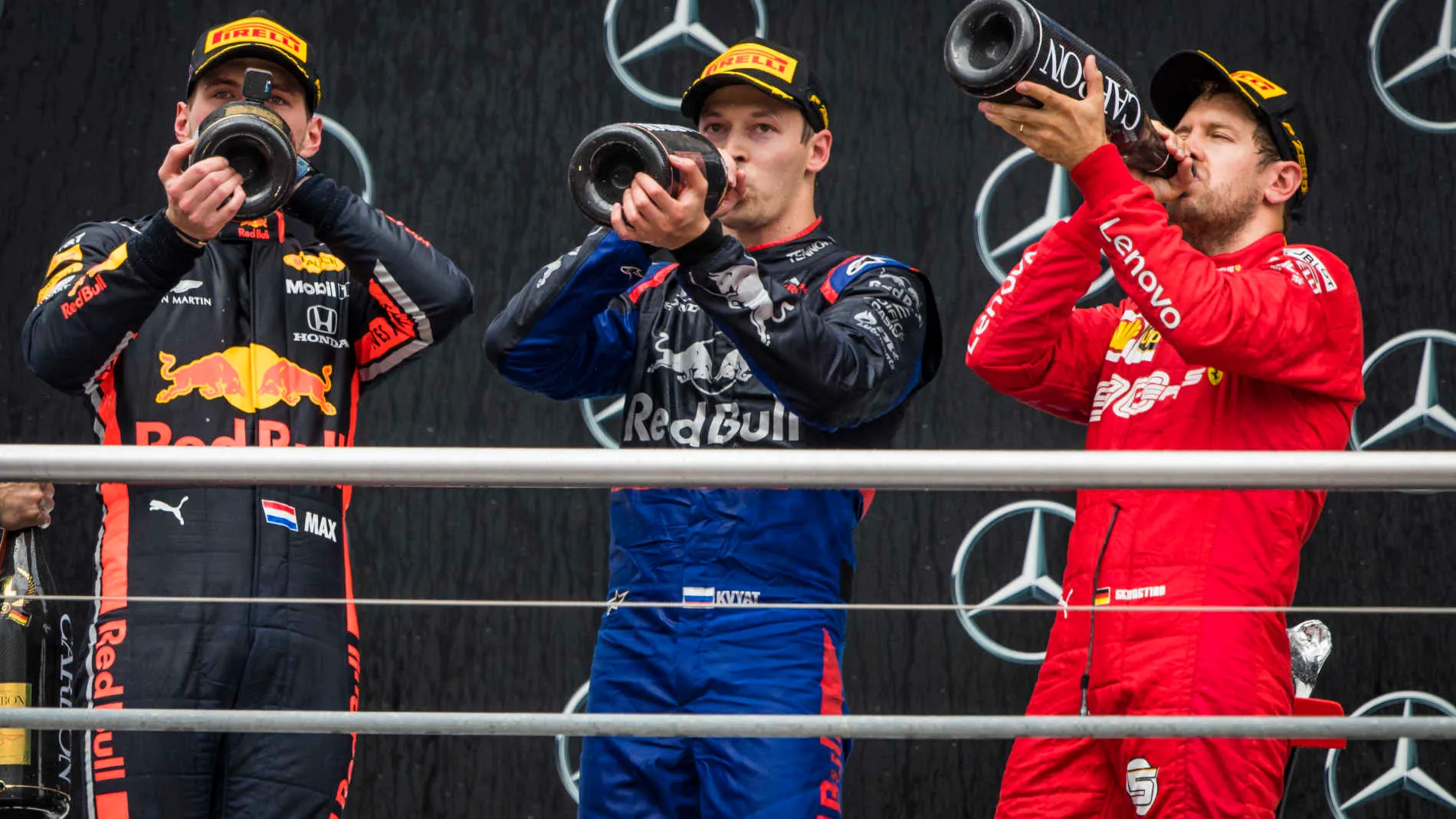 HOCKENHEIMRING, GERMANY - JULY 28: Race winner Max Verstappen, Red Bull Racing, Daniil Kvyat, Toro