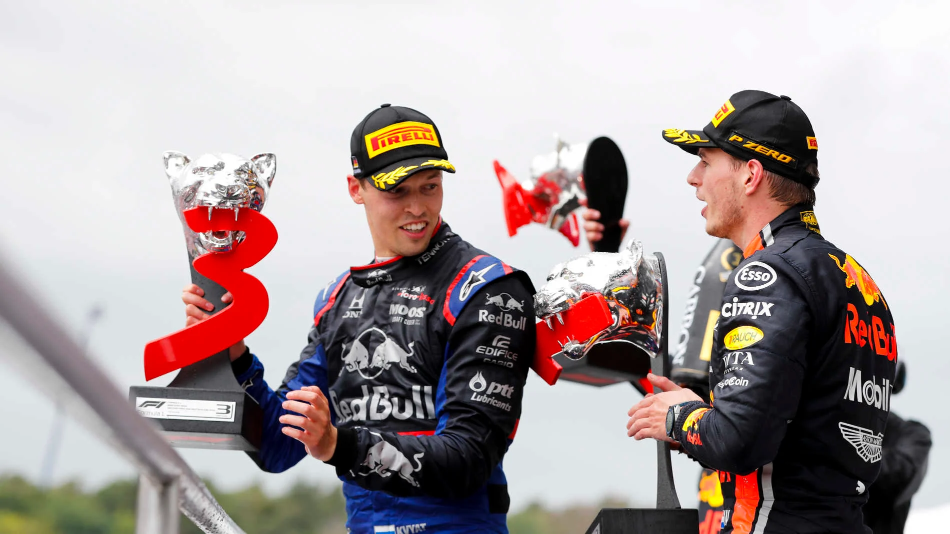 HOCKENHEIMRING, GERMANY - JULY 28: Daniil Kvyat, Toro Rosso, 3rd position, and Max Verstappen, Red