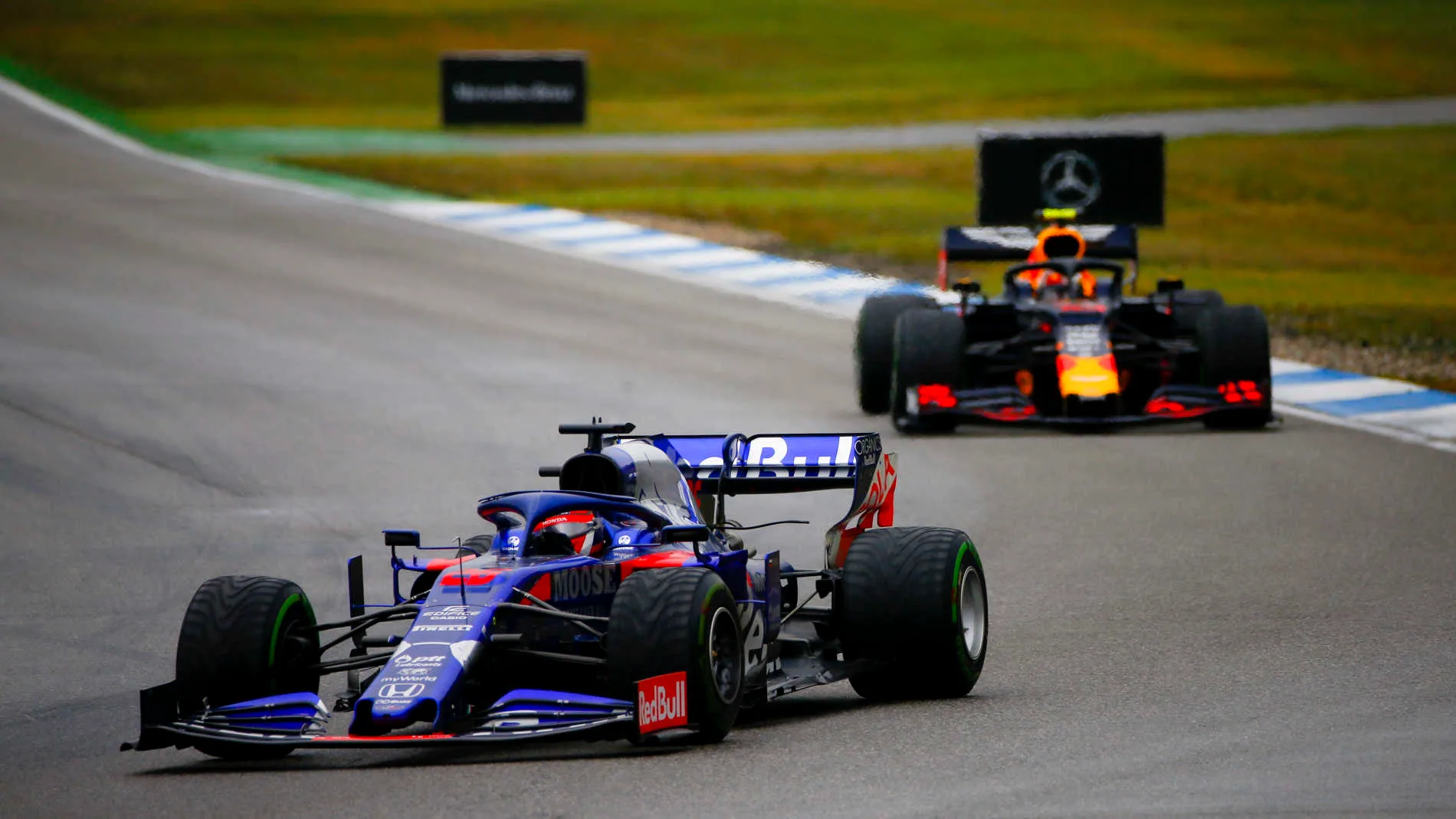 HOCKENHEIMRING, GERMANY - JULY 28: Daniil Kvyat, Toro Rosso STR14, leads Max Verstappen, Red Bull