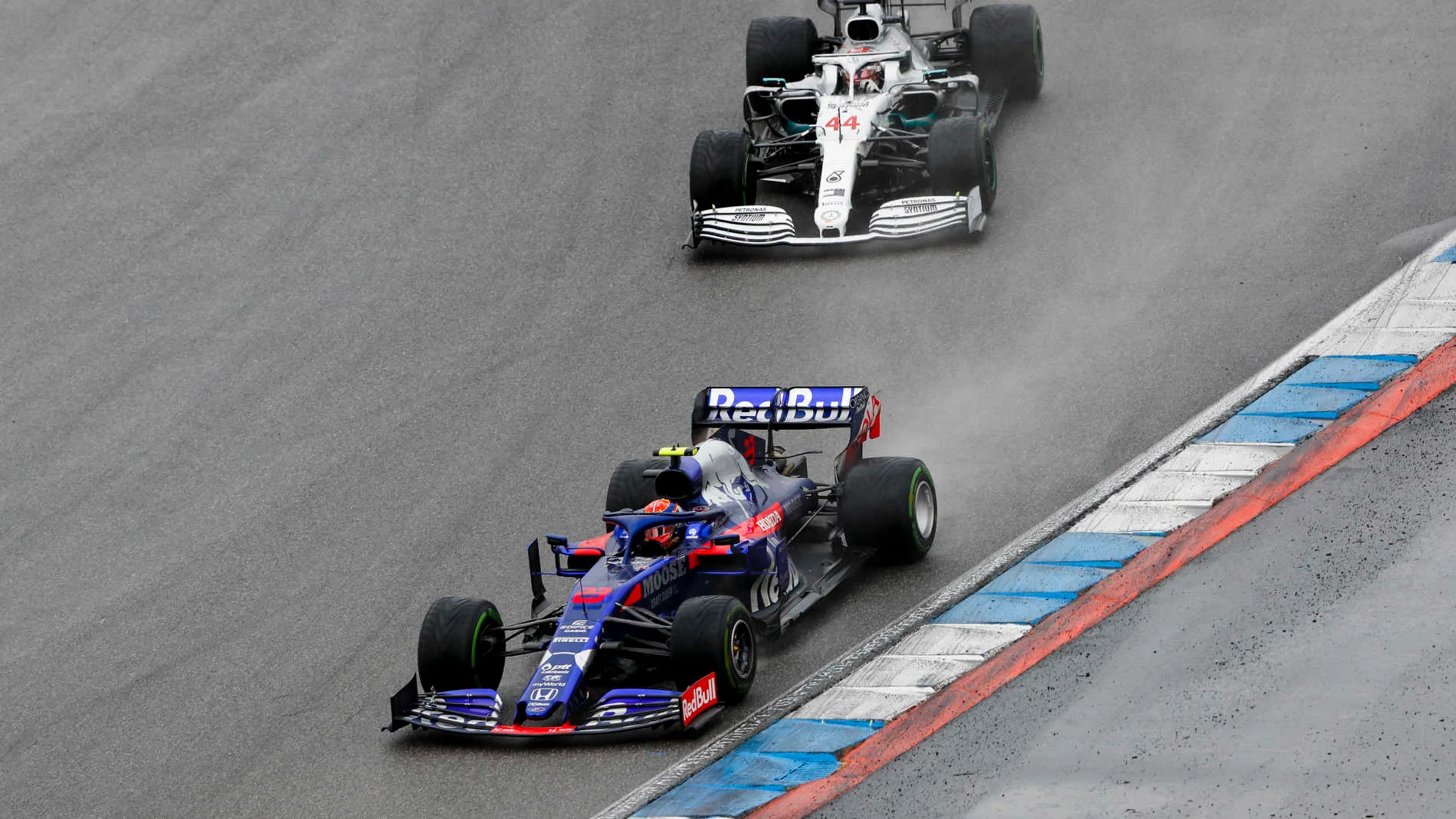 HOCKENHEIMRING, GERMANY - JULY 28: Alexander Albon, Toro Rosso STR14, leads Lewis Hamilton,