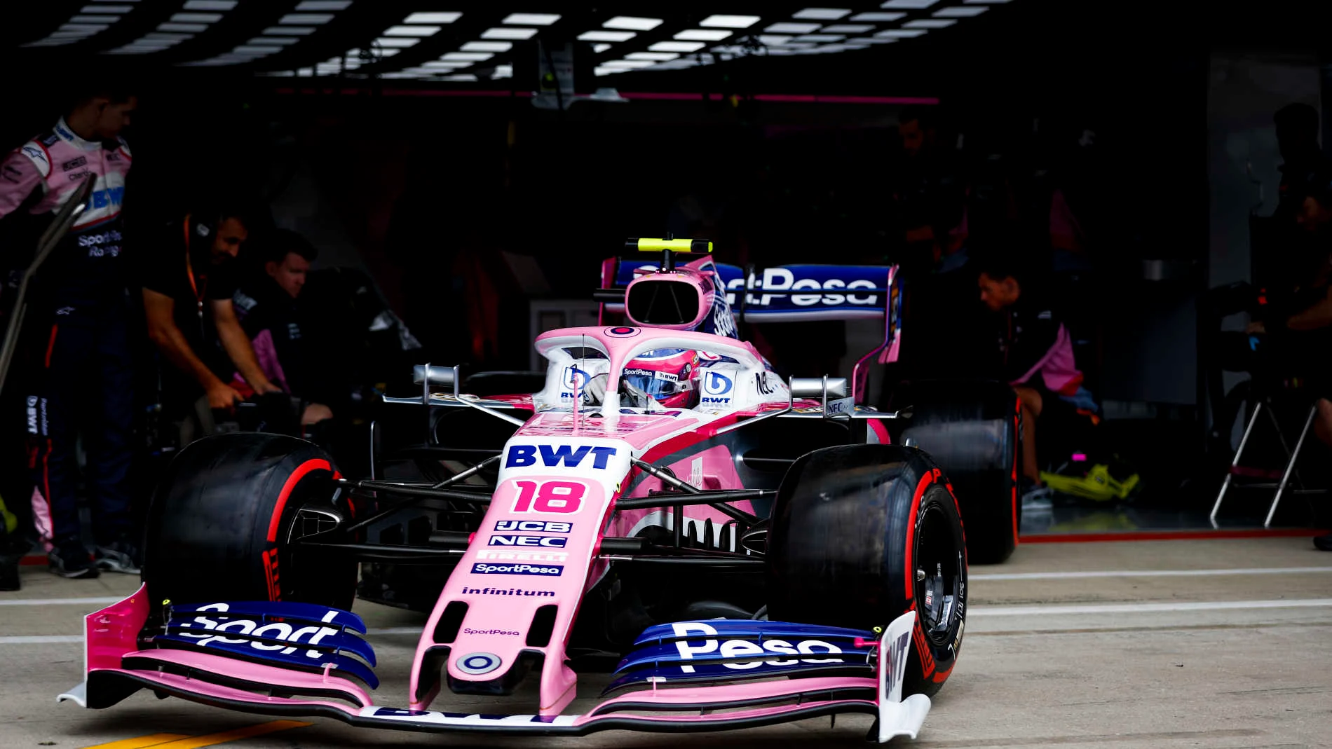 SILVERSTONE, UNITED KINGDOM - JULY 13: Lance Stroll, Racing Point RP19, leaves the garage during the British GP at Silverstone on July 13, 2019 in Silverstone, United Kingdom. (Photo by Glenn Dunbar / LAT Images)