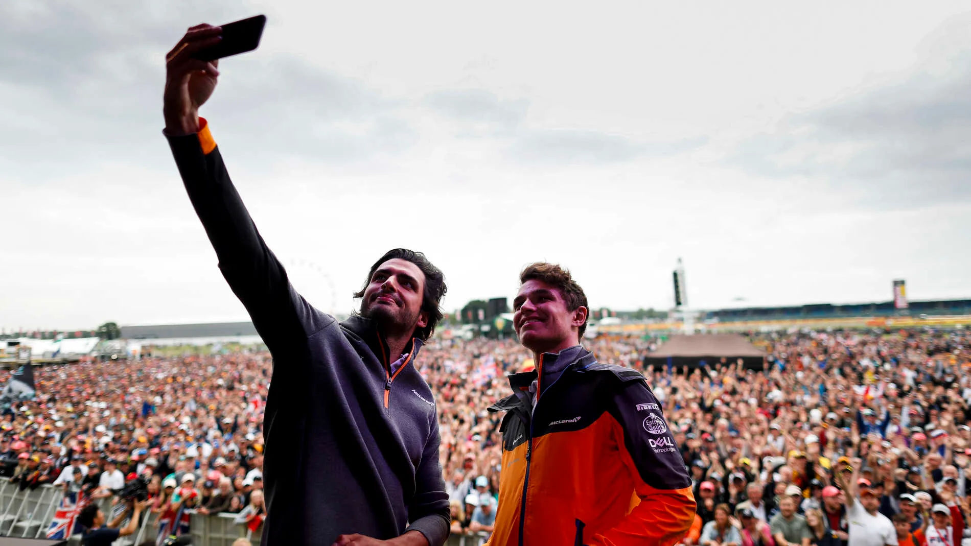 SILVERSTONE, UNITED KINGDOM - JULY 13: Carlos Sainz Jr, McLaren, and Lando Norris, McLaren, take a