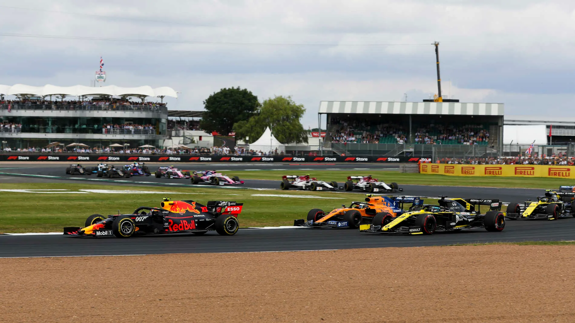SILVERSTONE, UNITED KINGDOM - JULY 14: Pierre Gasly, Red Bull Racing RB15, leads Lando Norris,