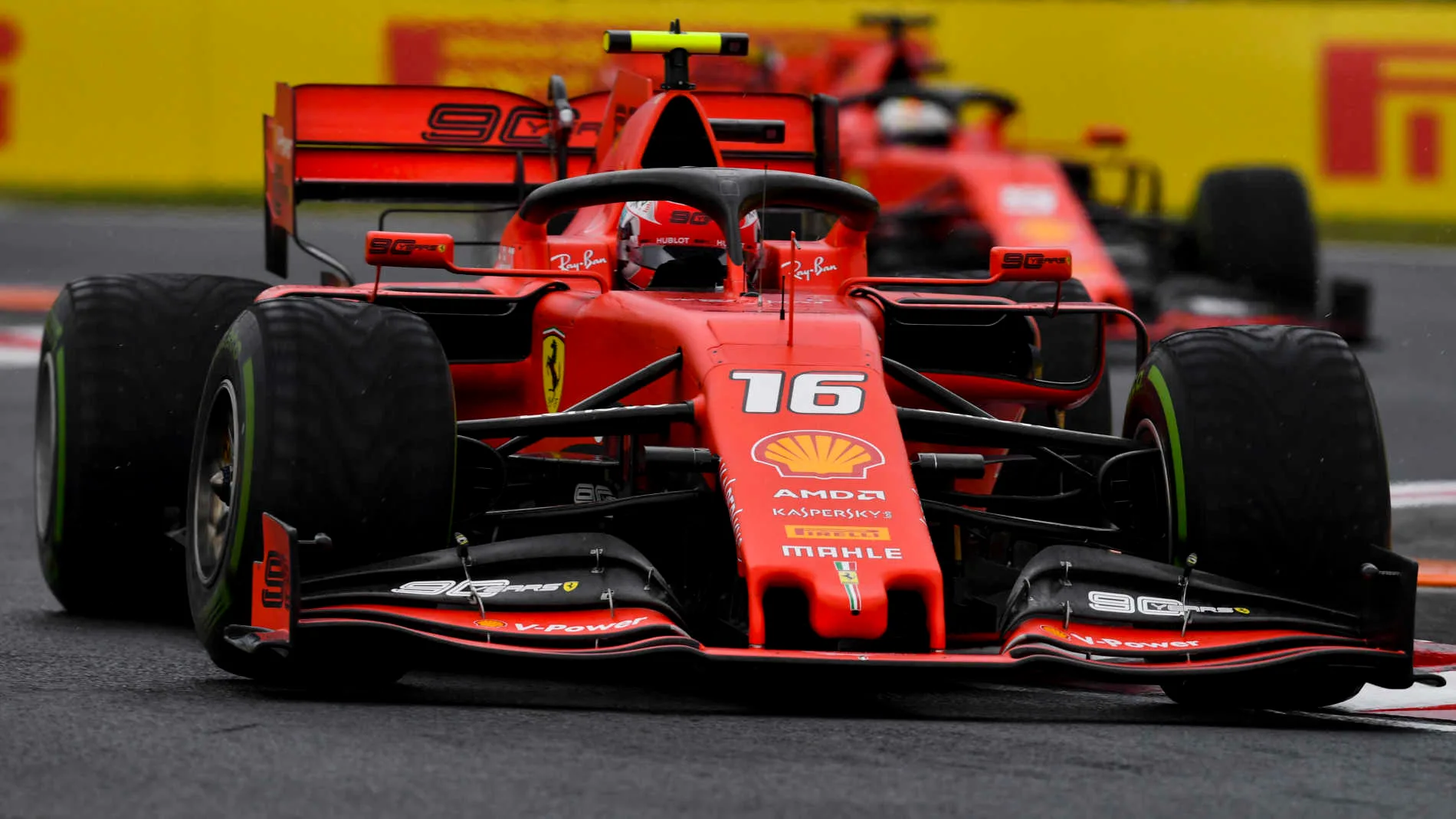 HUNGARORING, HUNGARY - AUGUST 02: Charles Leclerc, Ferrari SF90, leads Sebastian Vettel, Ferrari
