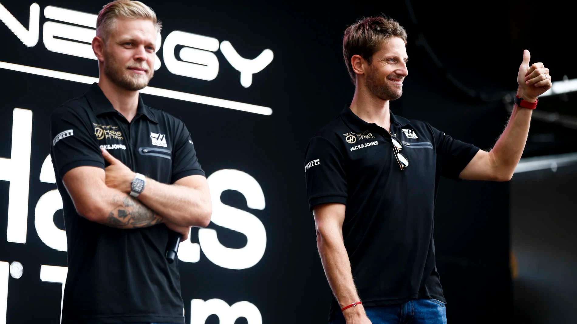 HUNGARORING, HUNGARY - AUGUST 03: Kevin Magnussen, Haas F1, and Romain Grosjean, Haas F1, on stage
