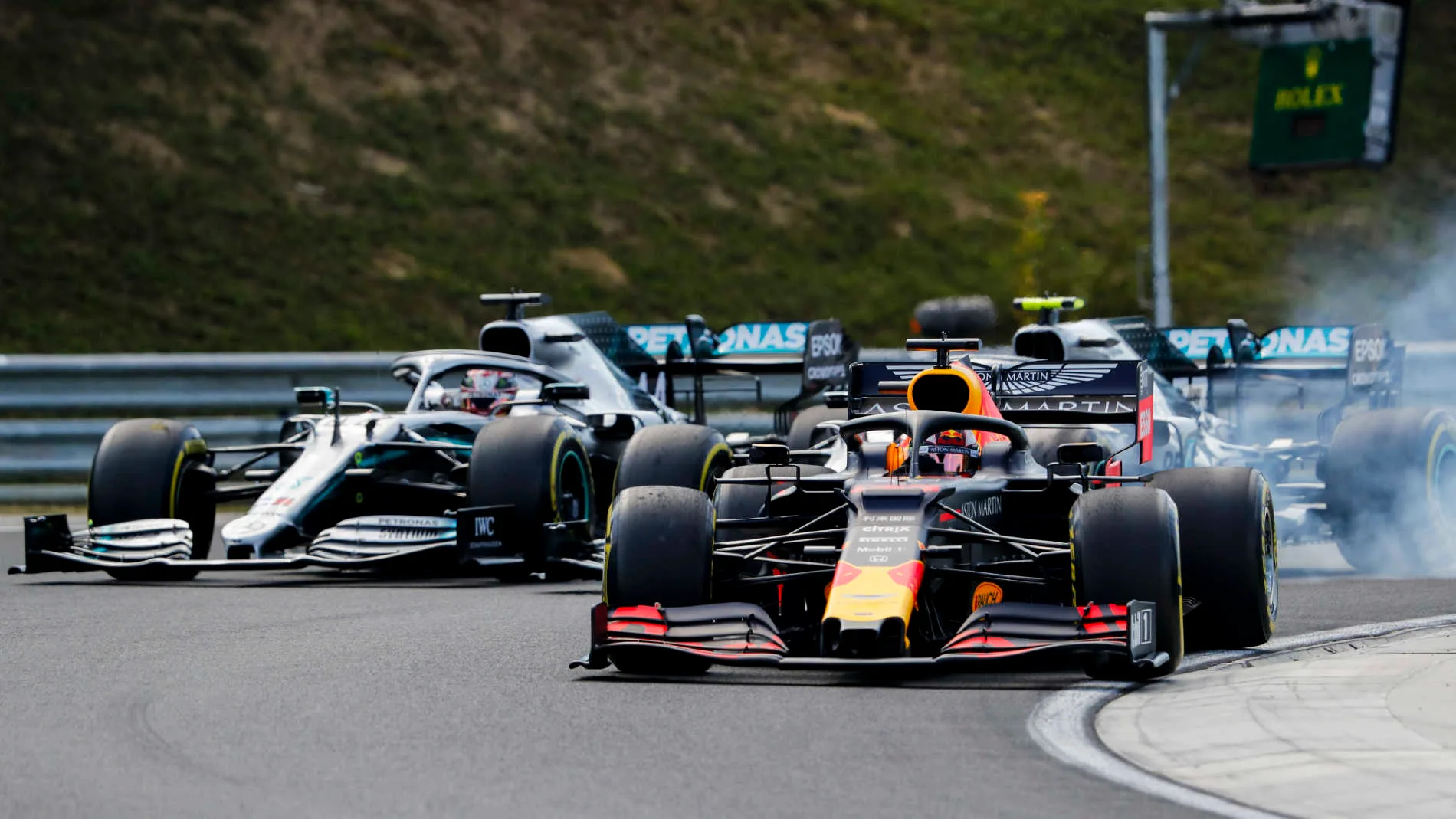 HUNGARORING, HUNGARY - AUGUST 04: Max Verstappen, Red Bull Racing RB15 leads Valtteri Bottas,