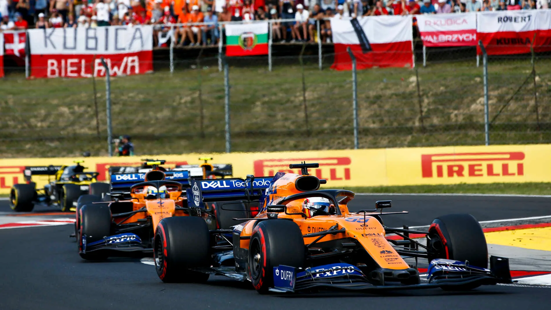 HUNGARORING, HUNGARY - AUGUST 04: Carlos Sainz Jr., McLaren MCL34, leads Lando Norris, McLaren