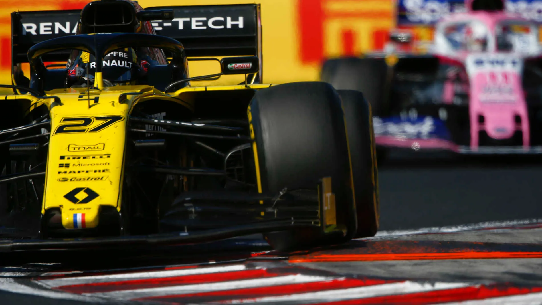 HUNGARORING, HUNGARY - AUGUST 04: Nico Hulkenberg, Renault R.S. 19, leads Sergio Perez, Racing Point RP19 during the Hungarian GP at Hungaroring on August 04, 2019 in Hungaroring, Hungary. (Photo by Andy Hone / LAT Images)