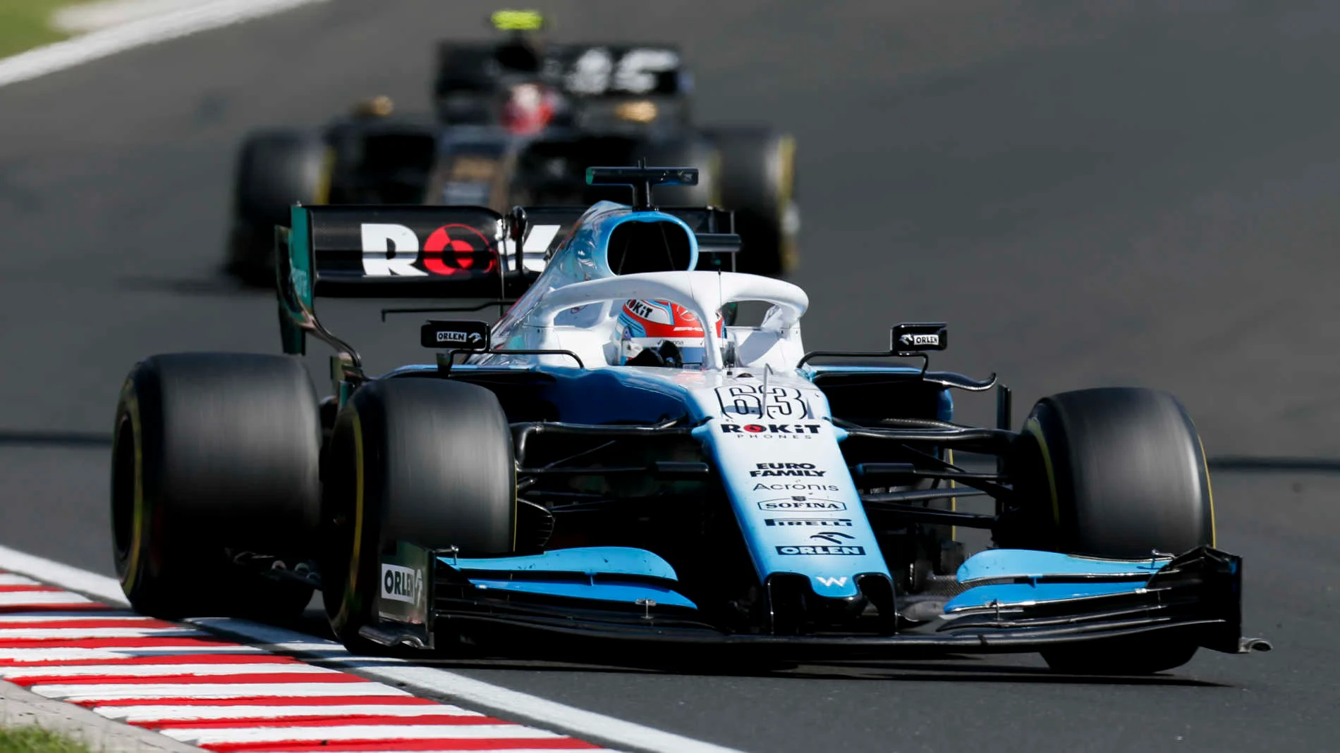 HUNGARORING, HUNGARY - AUGUST 04: George Russell, Williams Racing FW42, leads Kevin Magnussen, Haas