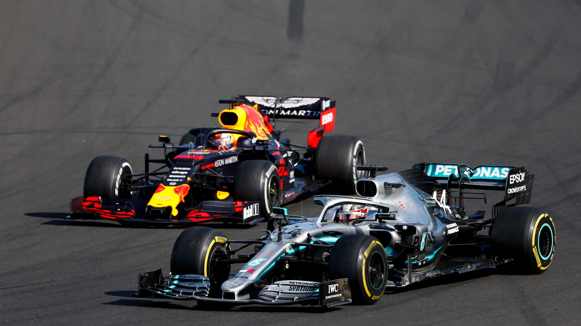 HUNGARORING, HUNGARY - AUGUST 04: Lewis Hamilton, Mercedes AMG F1 W10 overtakes Max Verstappen, Red