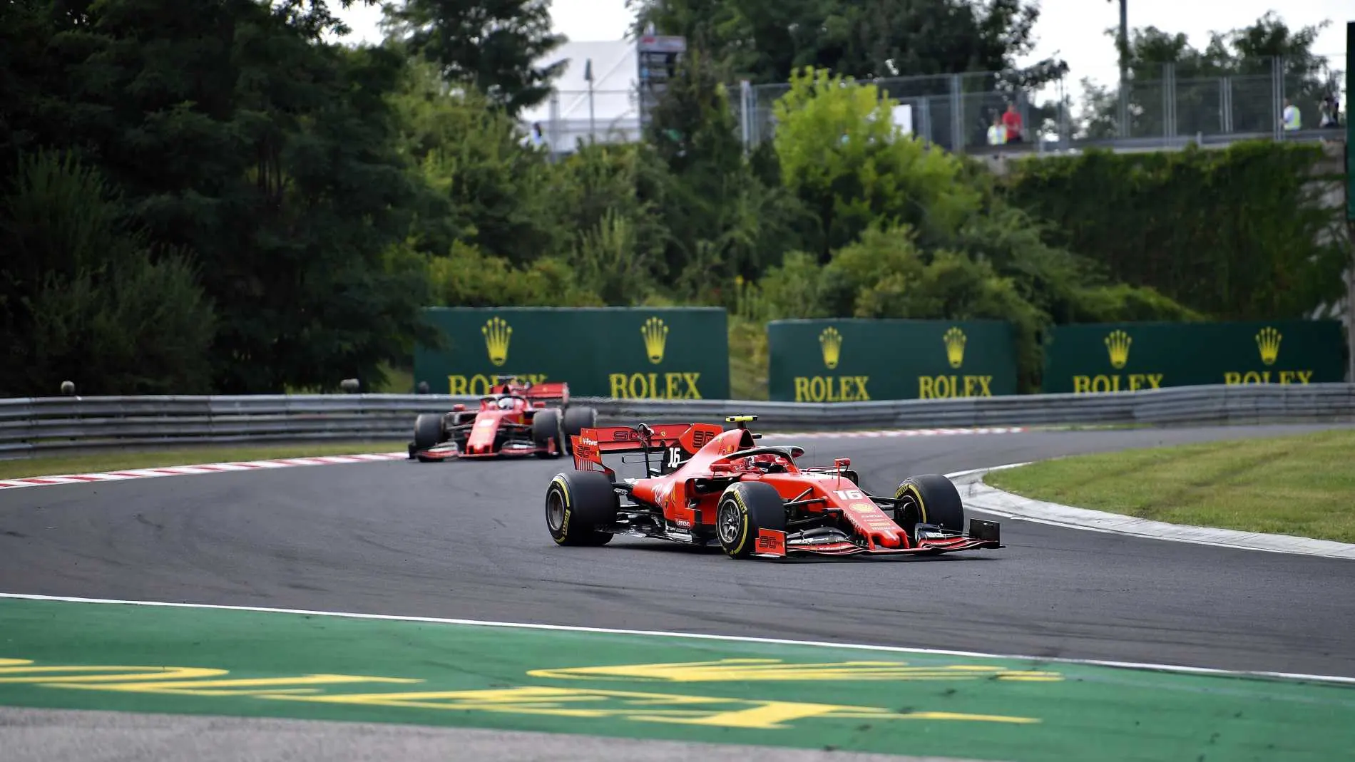 HUNGARORING, HUNGARY - AUGUST 04: Charles Leclerc, Ferrari SF90, leads Sebastian Vettel, Ferrari