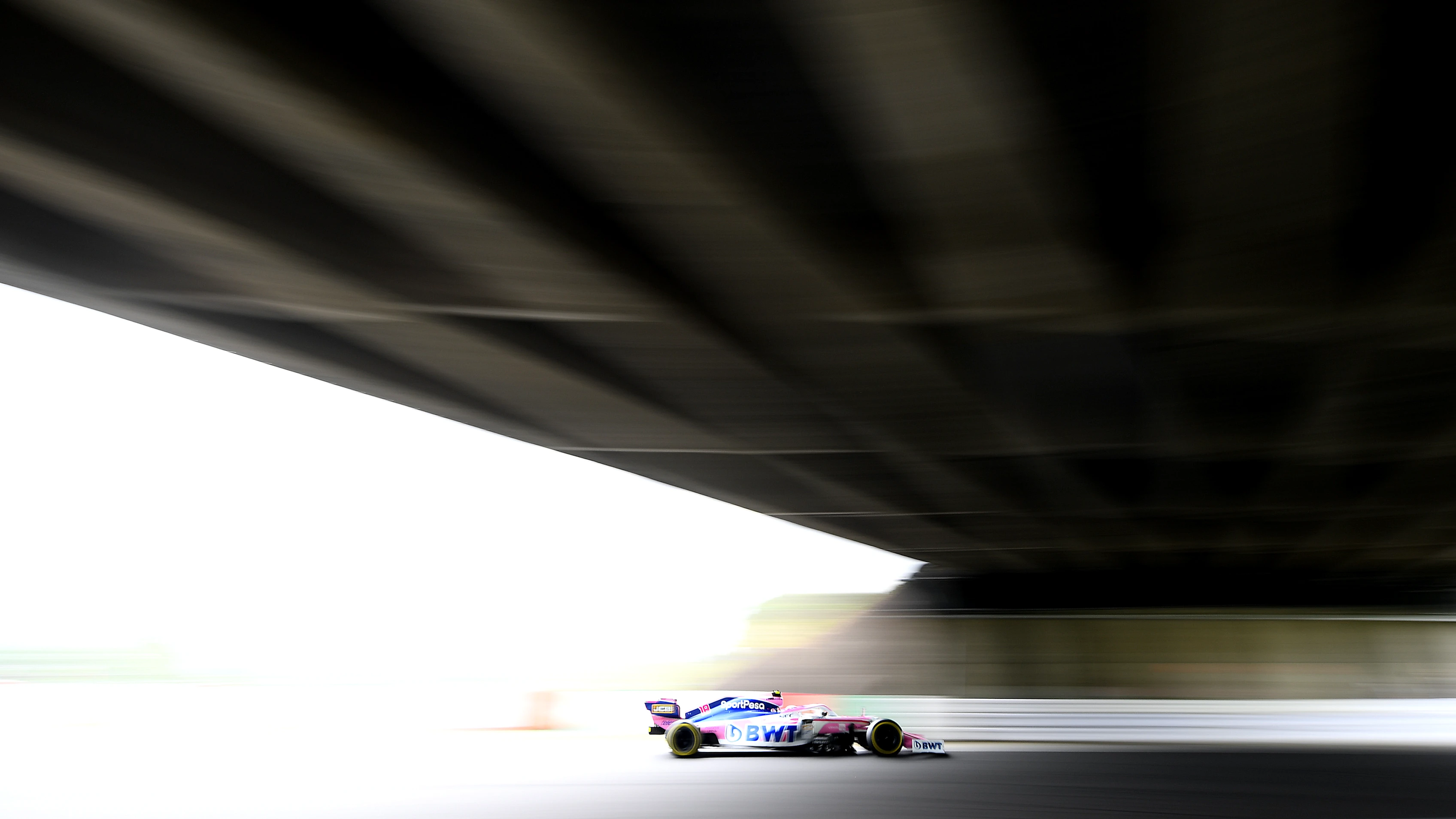 SUZUKA, JAPAN - OCTOBER 11: Lance Stroll of Canada driving the (18) Racing Point RP19 Mercedes on
