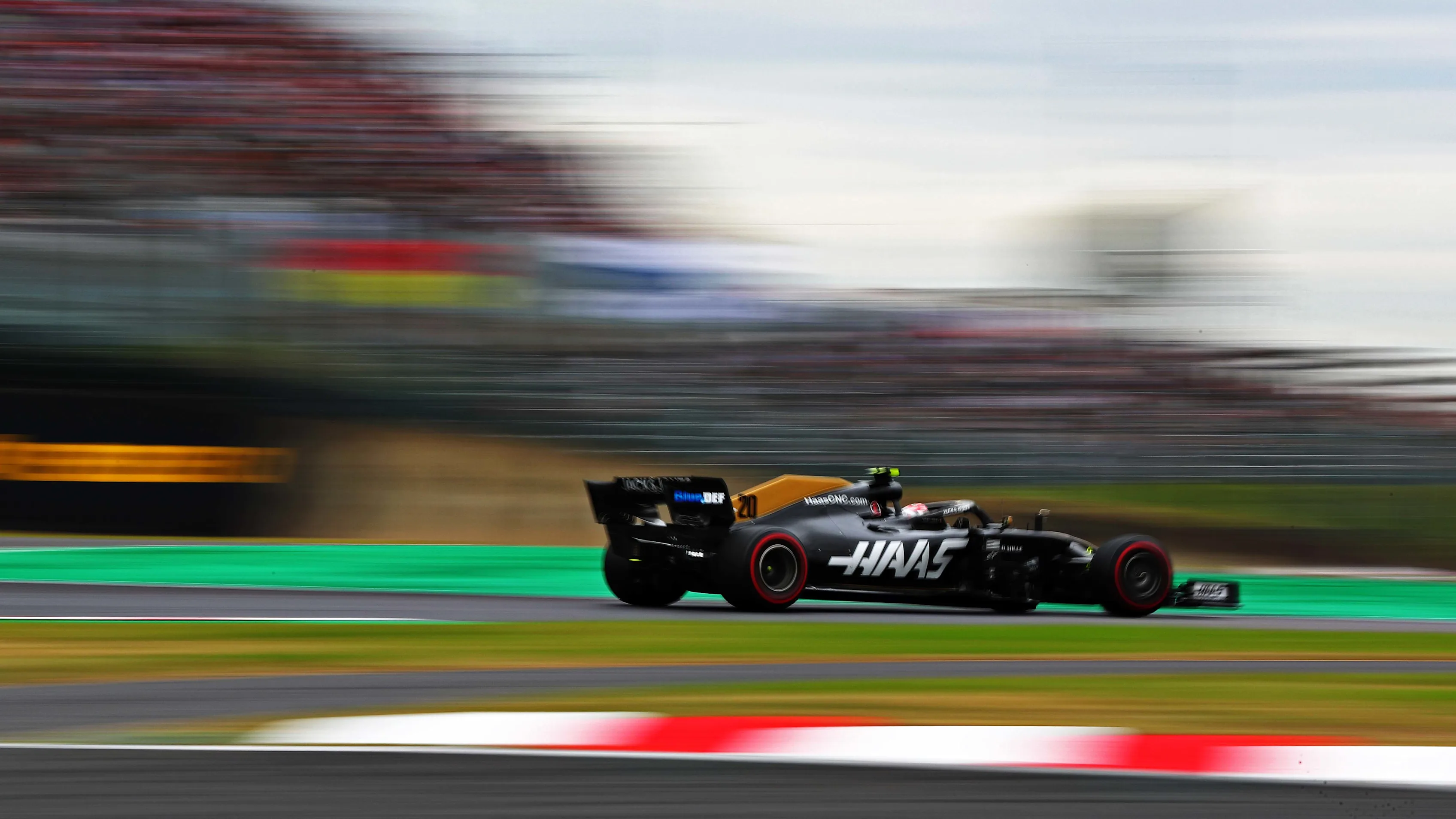 SUZUKA, JAPAN - OCTOBER 11: Kevin Magnussen of Denmark driving the (20) Haas F1 Team VF-19 Ferrari