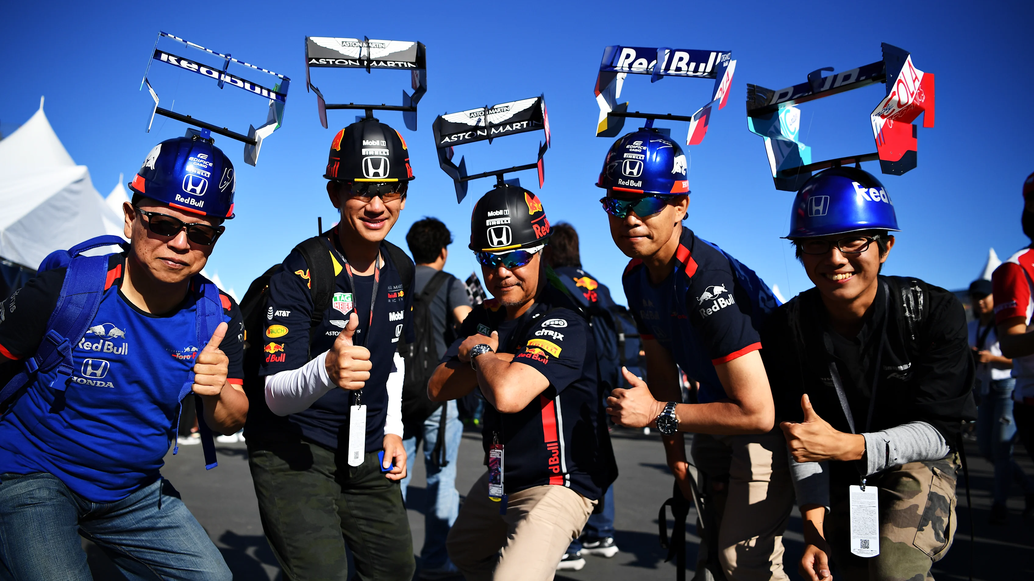 SUZUKA, JAPAN - OCTOBER 13: Red Bull Racing and Scuderia Toro Rosso fans show their support before
